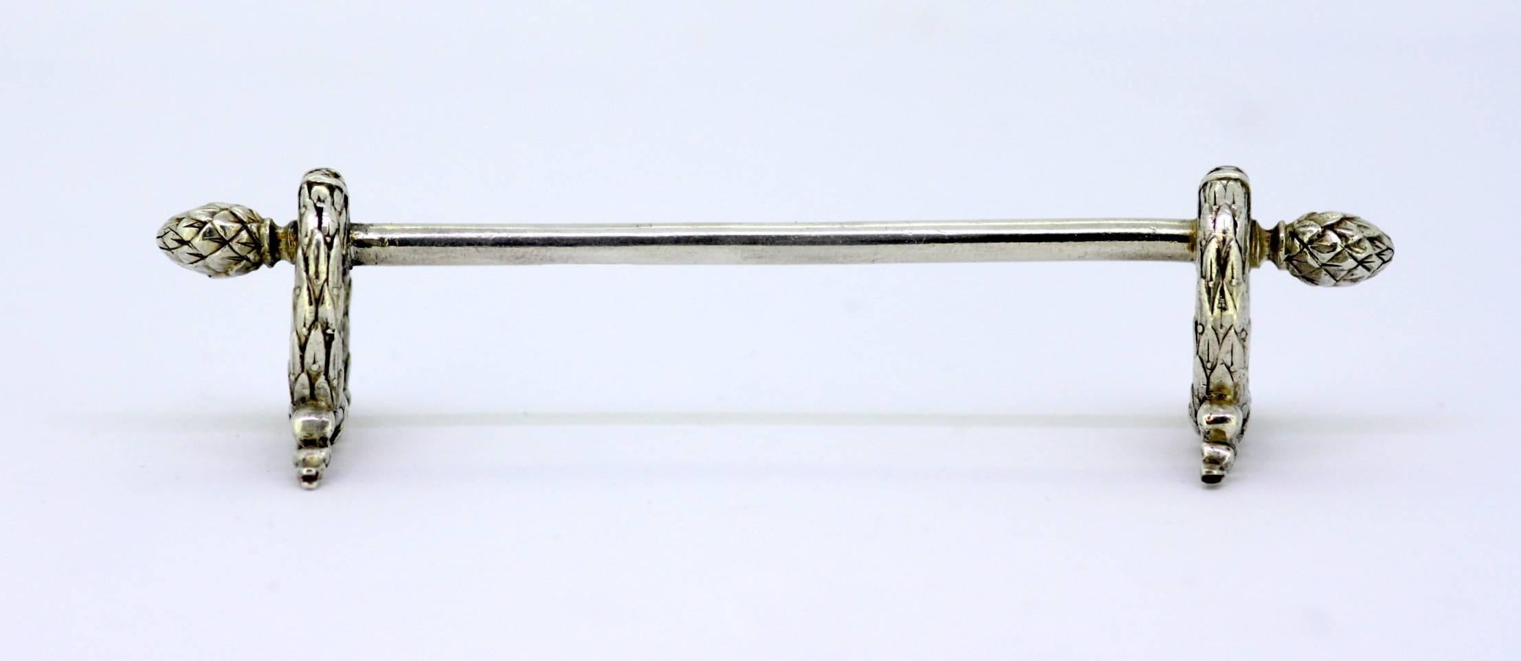 Antique Russian silver knife rest
Maker: Fabergé
Russia, late 19th century
Fully hallmarked

Dimensions:
Size : 10.3 x 2.8 x 2.4 cm
Weight : 28 grams total

Condition: Surface wear from general usage along with some minor age related wear,