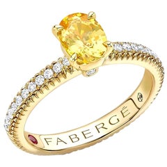 Fabergé 18k Yellow Gold Oval Yellow Sapphire Fluted Ring with Diamond Shoulders
