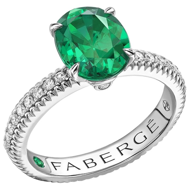 Fabergé 18 Karat White Gold Oval Emerald Ring with Diamond Set Shoulders For Sale