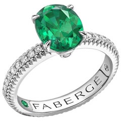 Fabergé 18 Karat White Gold Oval Emerald Ring with Diamond Set Shoulders