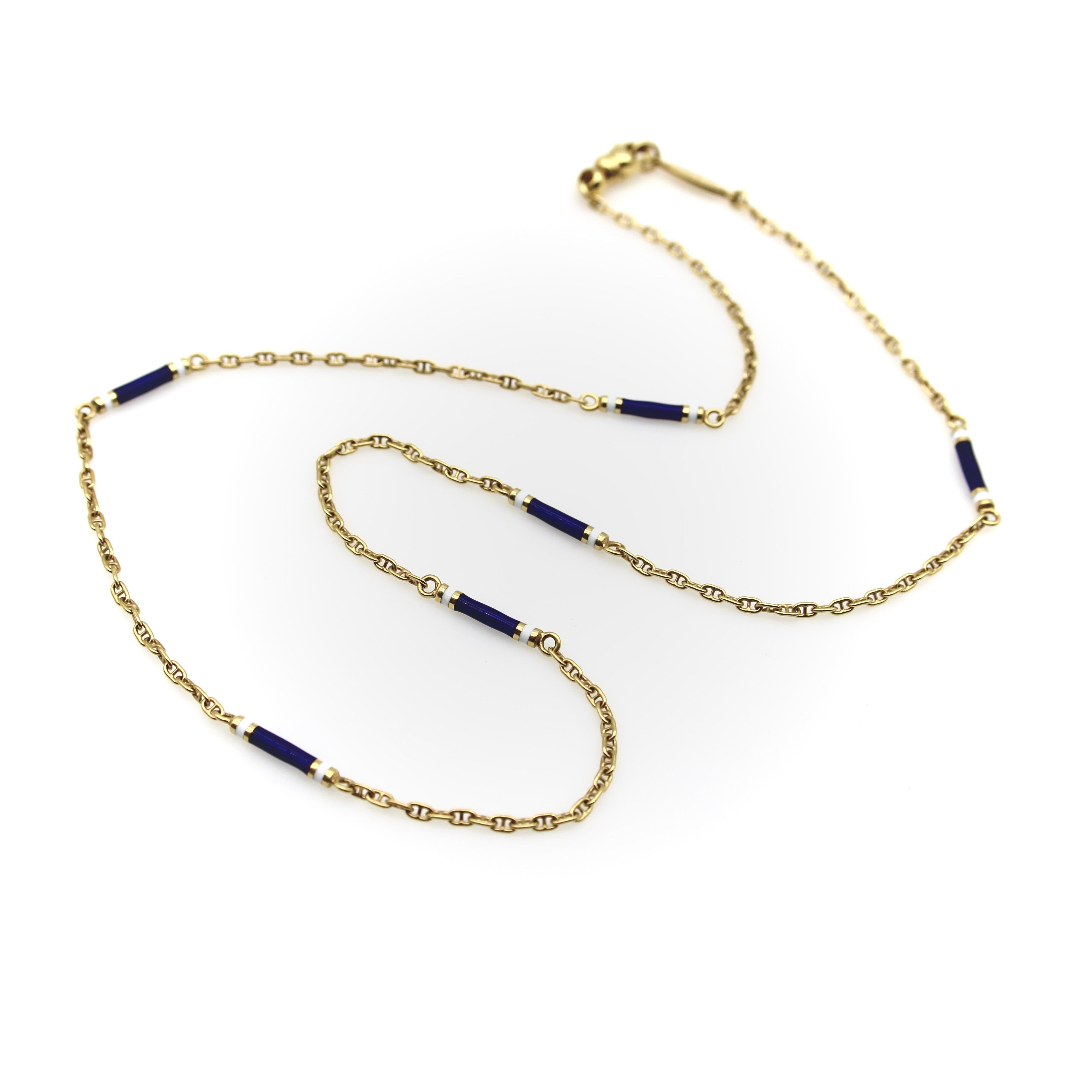 This handmade 18k gold mariners link chain was designed by VICTOR MAYER for Fabergé. It features stations of cobalt blue enamel, transparent to reveal the guilloche engravings underneath, and opaque white enamel sandwiched between gold details. The