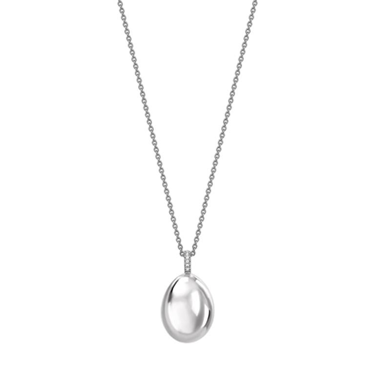 The price and availability of this piece is for US clients only. Please inquire for pricing and availability in your region.

This White Gold Egg Pendant features round white diamonds, set in 18 karat white gold. The egg pendant is 18mm. The Essence