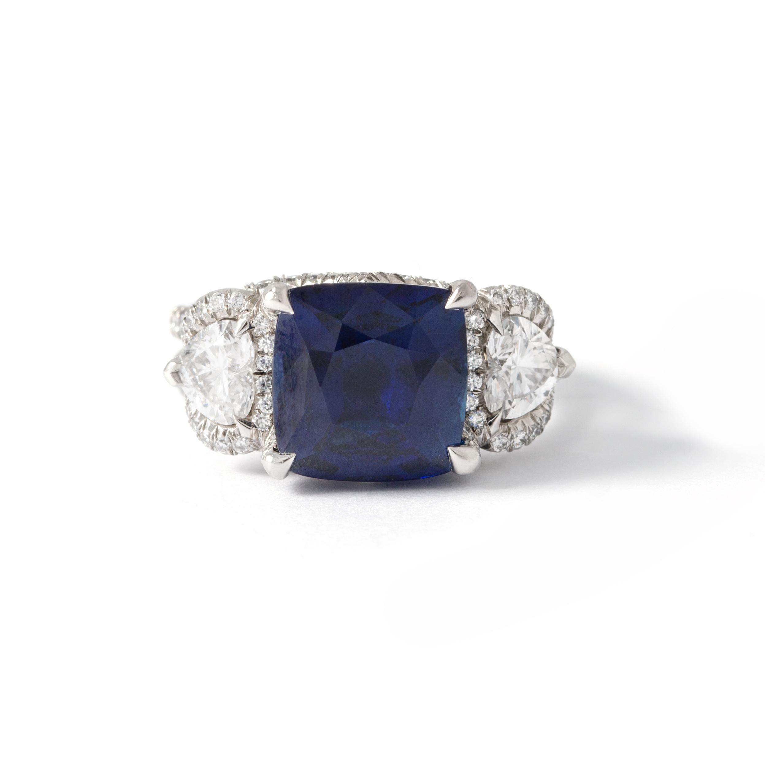 Fabergé 6.01 carat Burmese non heated Natural Sapphire Diamond Platinum Ring.

Diamond 1-Round 0,51ct VS1.
Diamond 1-Round 0,5ct VS1.
Diamonds 22-Round-0,32ct VS1.
Diamonds 96-Round-0,91ct VS1.

Burmese non heated Natural Sapphire is accompanied by