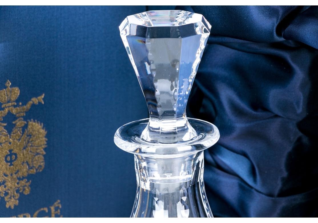Faberge Balzac decanter from the Imperial Collection, style #559-20, clear cut crystal, pyramidal form with narrow neck becoming bulbous at the body, alternating faceted vertical motifs with conforming faceted stopper. Etched signature as