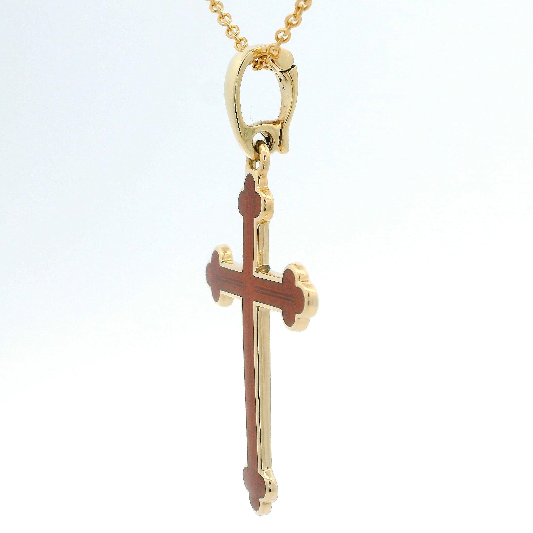 Exquisite Fabergé 18-Carat Yellow Gold Cross Pendant With Vivid Red Translucent Enamel and With Enhancer Bale. 

Elevate your style with this beautifully crafted Fabergé pendant—a distinguished addition for collectors on 1stdibs who appreciate rare