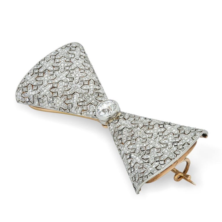 Antique Cushion Cut Faberge Diamond Gold Platinum Bow Brooch For Sale