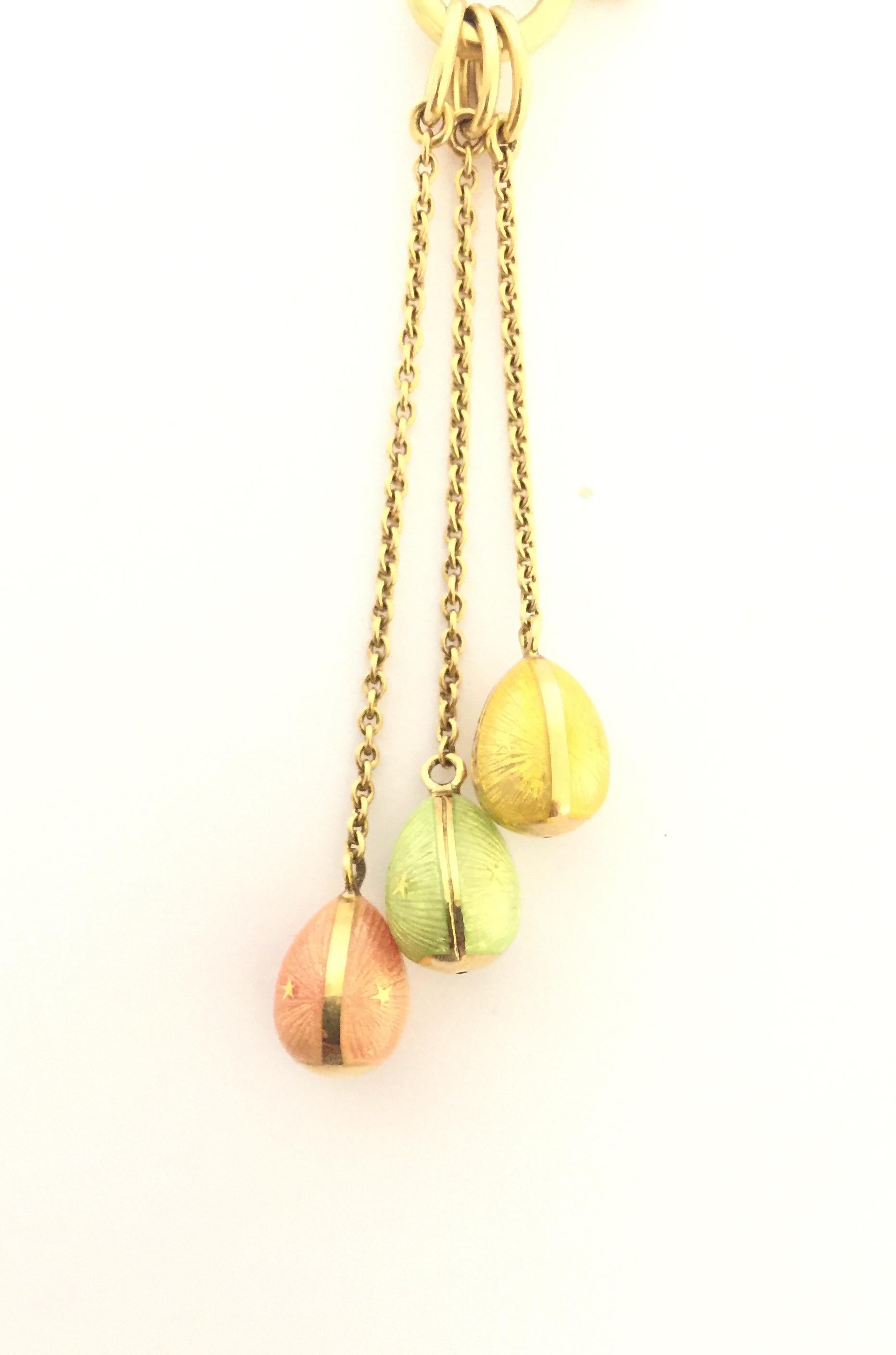 Faberge Egg charm Necklace.
18k Yellow Gold 
Orange, Yellow and Green Enamel Charm
F2506R1