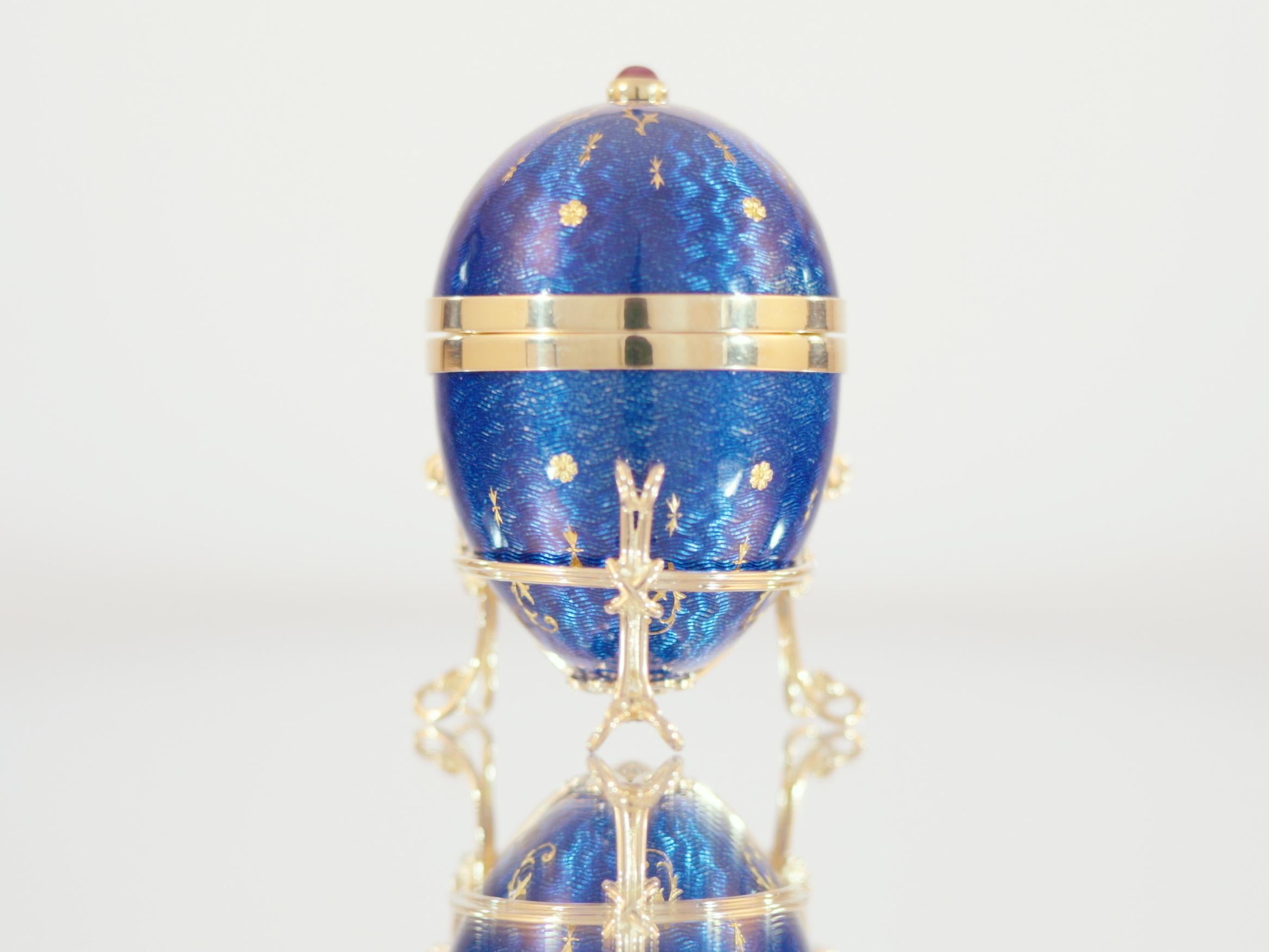 Brilliant Cut Fabergé Egg Object 18 K Yellow Gold Blue Guilloche Enamel Paillons Ruby Cabochon For Sale
