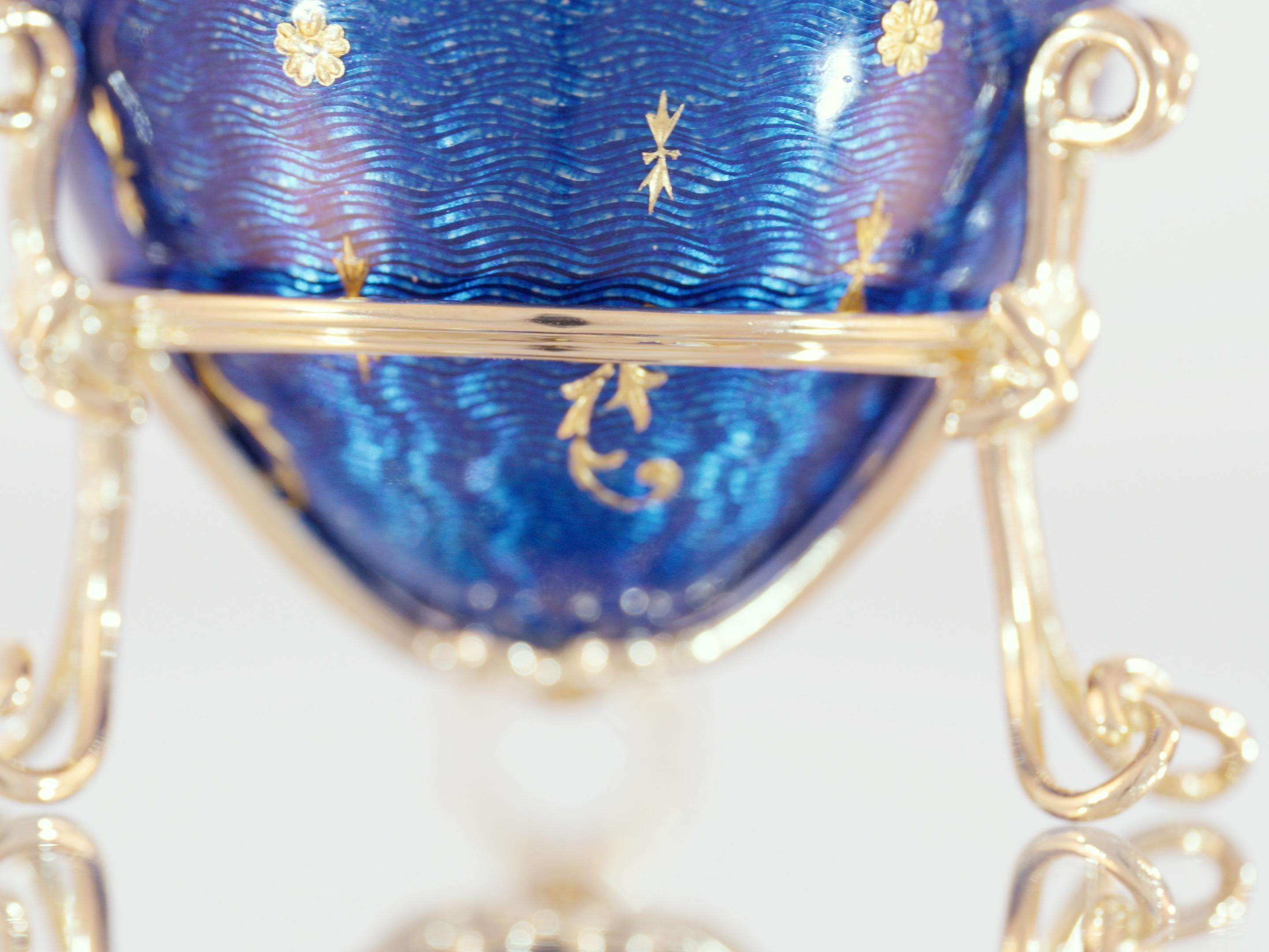 Women's or Men's Fabergé Egg Object 18 K Yellow Gold Blue Guilloche Enamel Paillons Ruby Cabochon For Sale