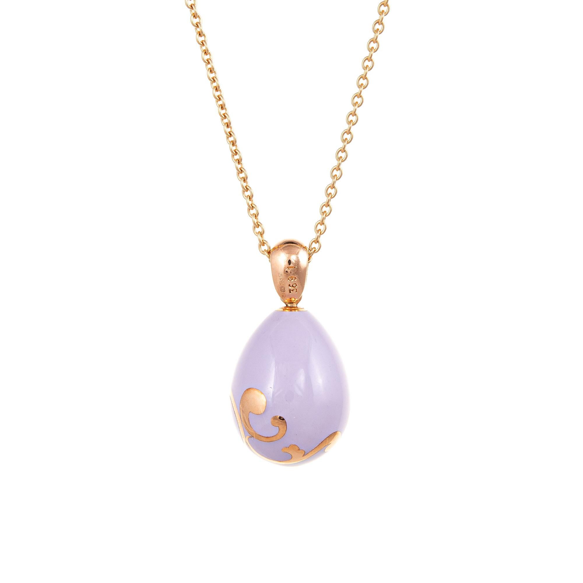 Elegant and finely detailed estate Faberge lilac egg pendant & necklace crafted in 18 karat rose gold.  

The egg features lilac enamel (in excellent condition and free of cracks or chips).  

From the Heritage Collection the egg draws inspiration