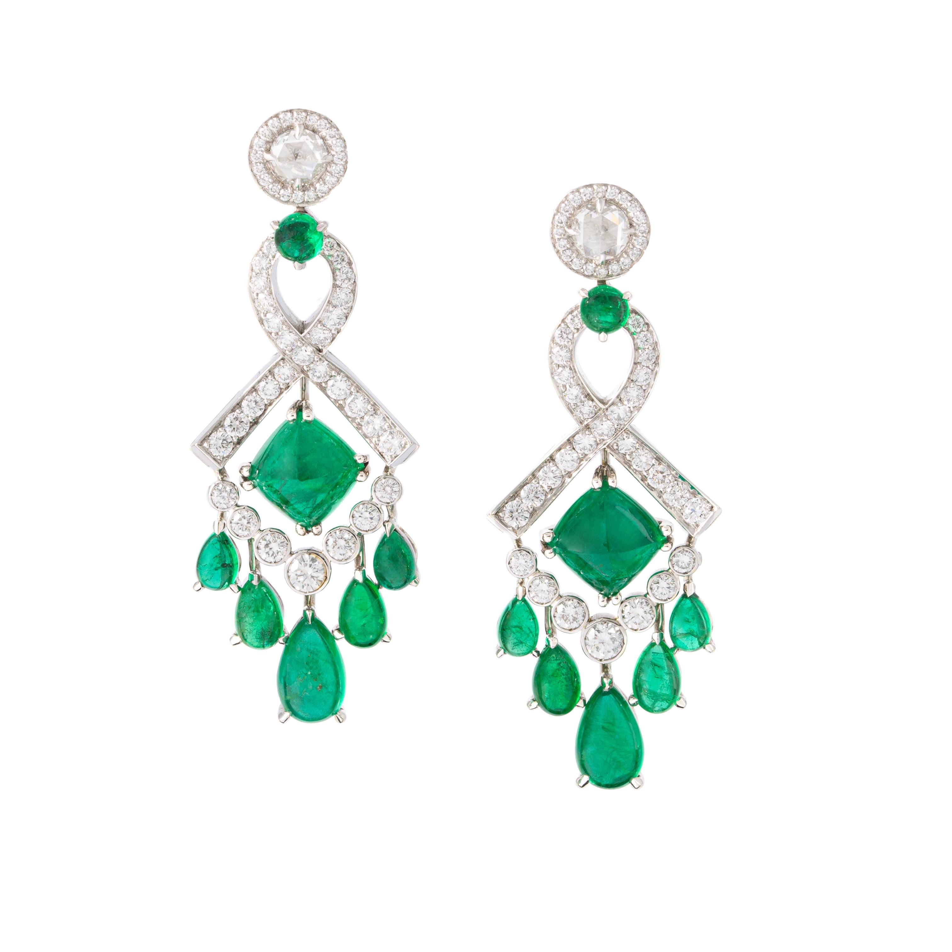 Fabergé Emerald Diamond White Gold 18K Earrings

Diamonds 2-Rose-0,58ct VS1,
Diamonds 2-Round-0,2ct VS1,
Diamonds 4-Round-0,18ct VS1,  
Diamonds 44-Round-0,86ct VS1, 
Diamonds 50-Round-0,19ct.

Gross weight: 16.57 grams.

Length: 4.50 cm
Width: max.
