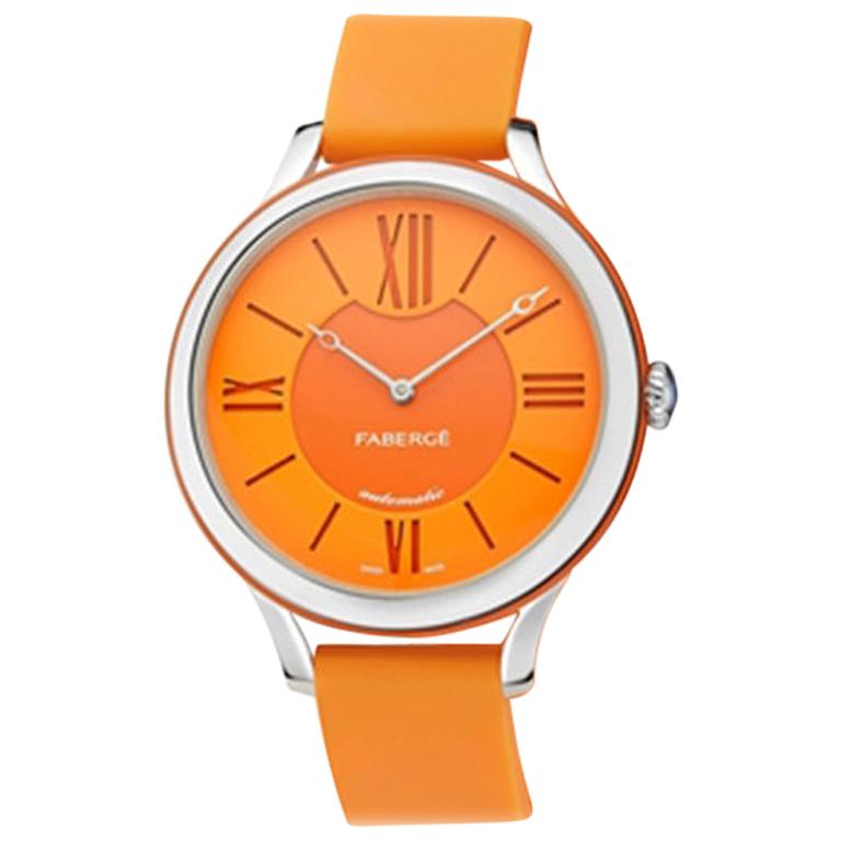 Fabergé Flirt 18 Karat White Gold, Orange Dial, US Clients For Sale