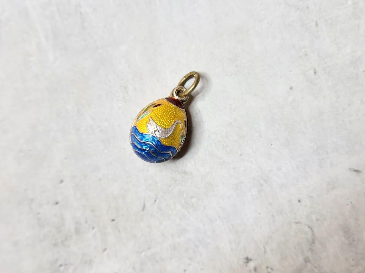 A Fabergé workmaster Anders Johan Nevalainen silver egg pendant, guilloche azure enameled and featuring an embossed image, was made in St. Petersburg, Russian Empire, in the late 19th century/early 20th century.
Anders Juhaninpoika Nevalainen is one
