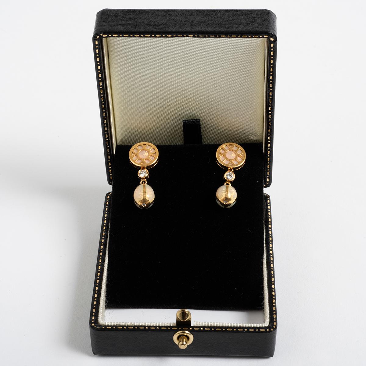 Our Faberge Heritage 18k Yellow Gold Diamond Enamel Drop Earrings (ref 1452) are presented in excellent condition with only light signs of use. Featuring four round white diamonds totalling 0.22cts and enamel, they are set in 18 carat yellow gold,