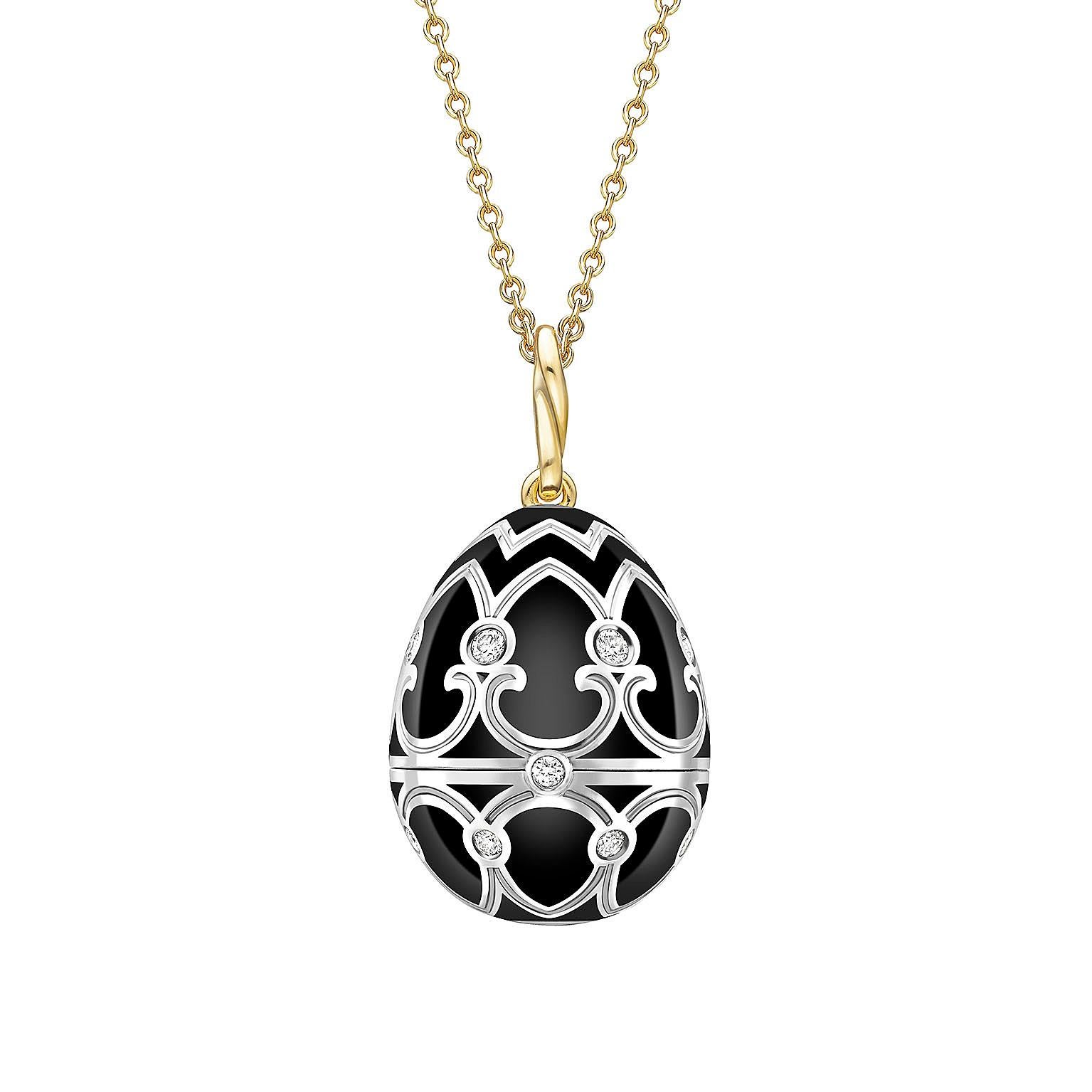 The Fabergé Heritage White Gold Diamond and Black Enamel Penguin Surprise Locket is crafted from 18k yellow gold, decorated with black and white enamel and set with a glittering white diamond eye.

The penguin dances on a sparkling silicate agate