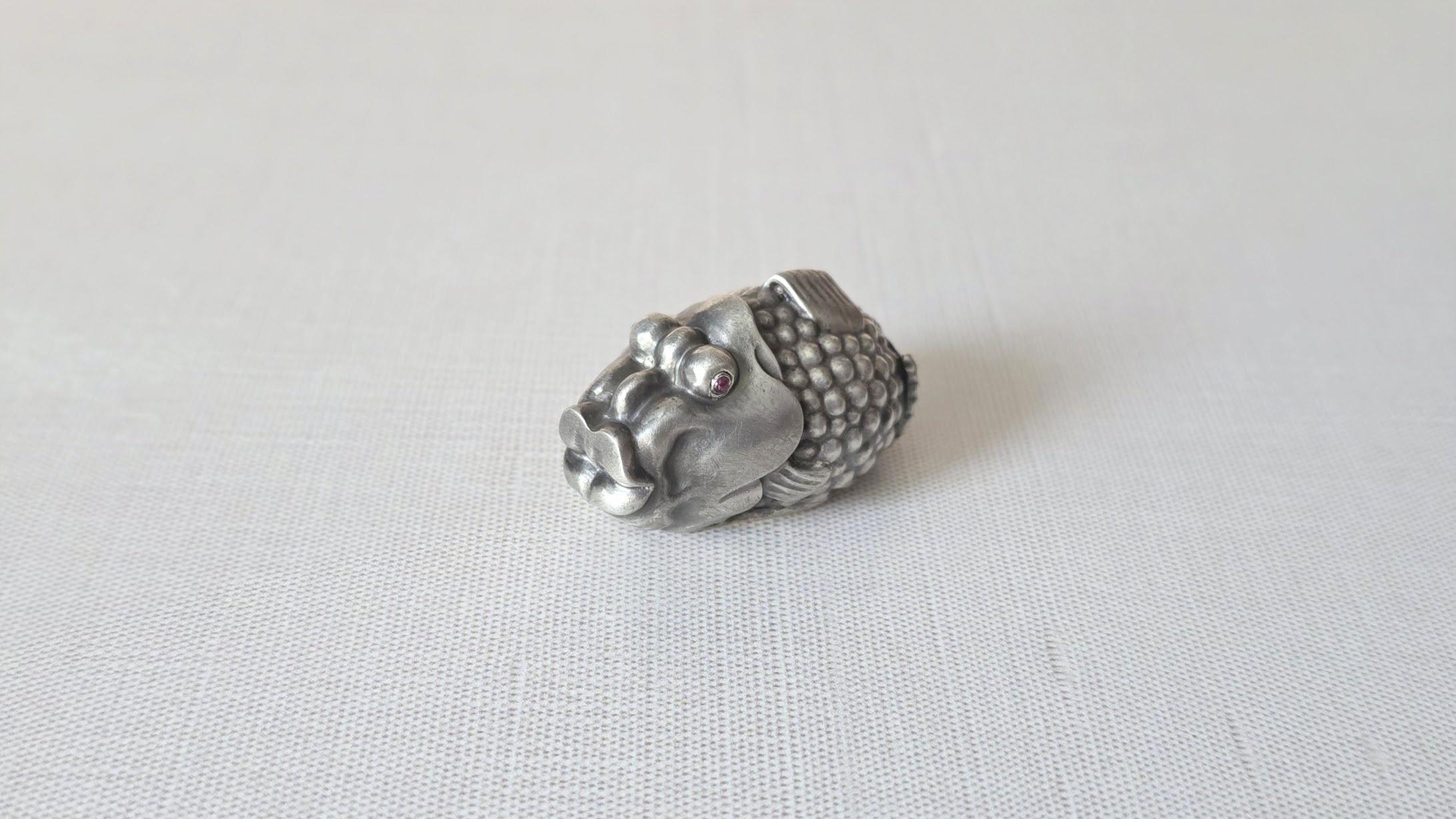 Introducing a charming antique silver fish with ruby eyes, crafted for the Russian Imperial court by one of Carl Fabergé’s finest jewelers, Julius Rappoport.

Julius Rappoport created most of the elegant silver animal figurines for the House of