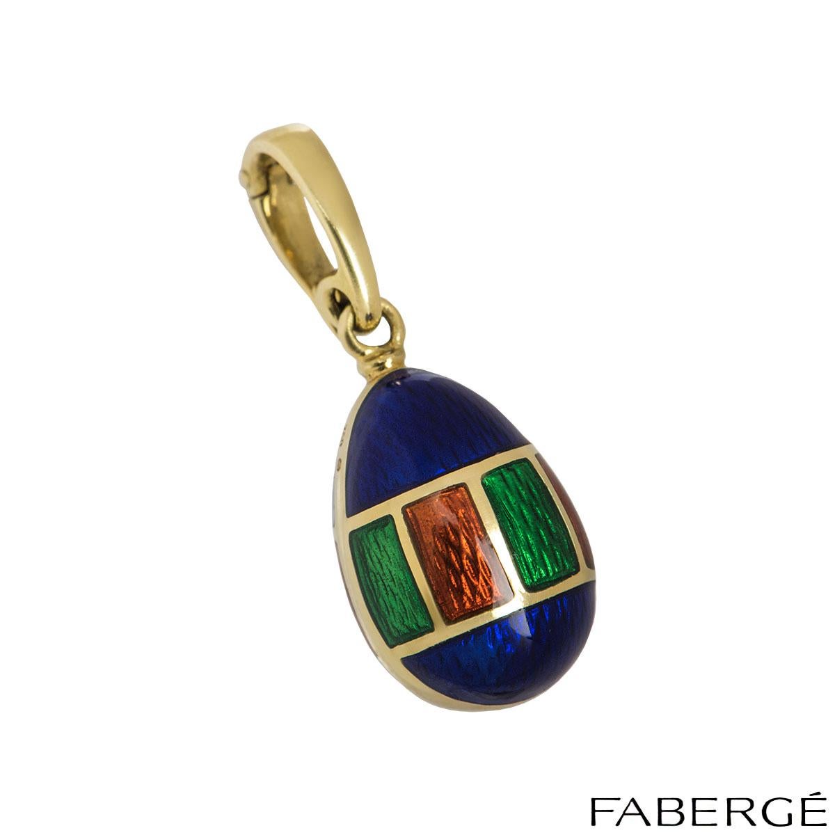 An 18k yellow gold egg charm by Faberge from the Victor Mayer collection. The egg charm features blue, green and red painted enamel alternating in shapes. The charm features a loop bail with a gross weight of 7.40 grams

This Limited Edition piece,