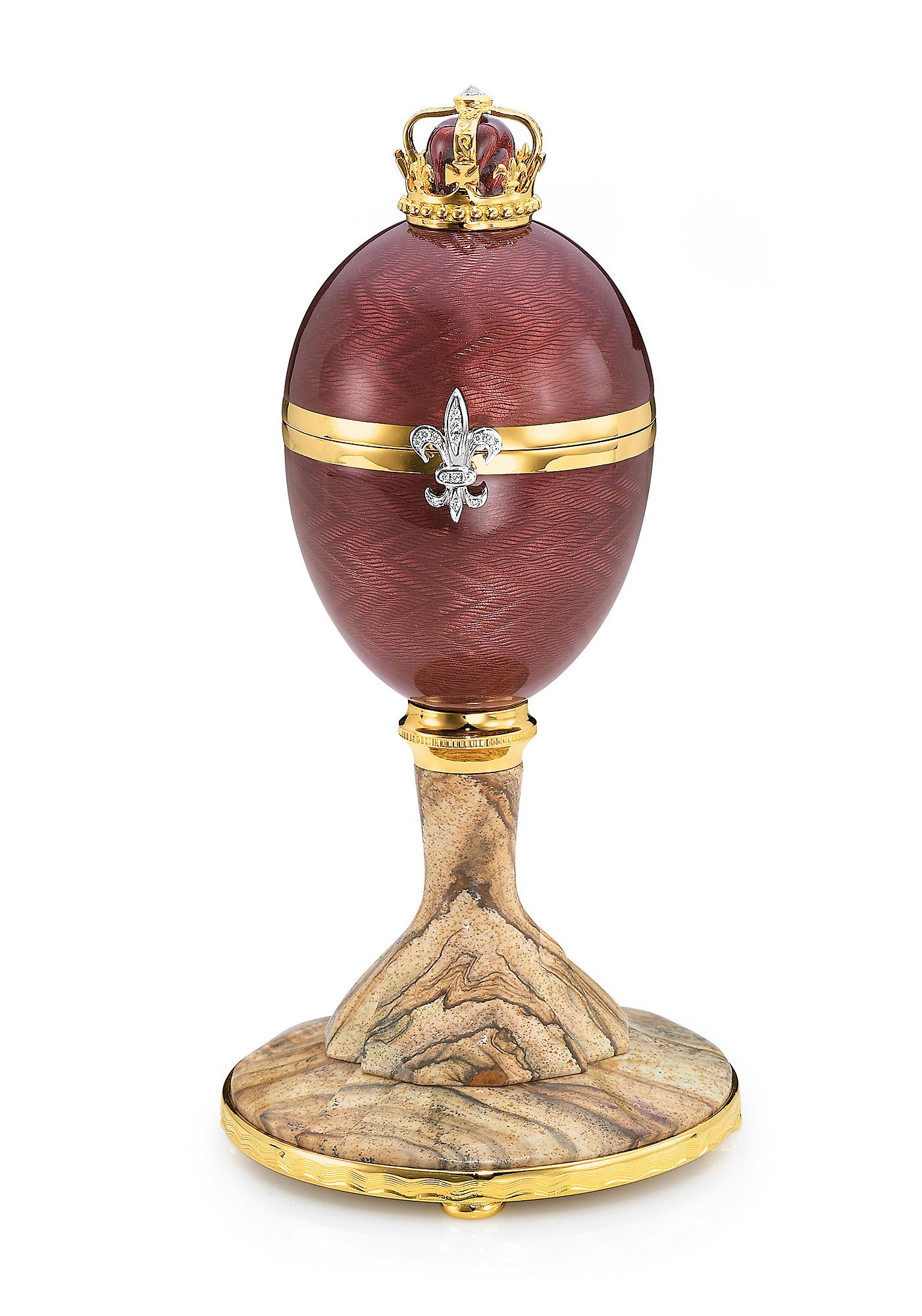 Fabergé Lion Egg, objet d'art / objet de vertu, workmaster Victor Mayer, 18-carat yellow gold, 16 brilliant-cut diamonds totalling 0.198ct G VS, translucent purple guilloché enamel, Kalahari jasper, limited edition, number 2 of 75.

This Fabergé egg