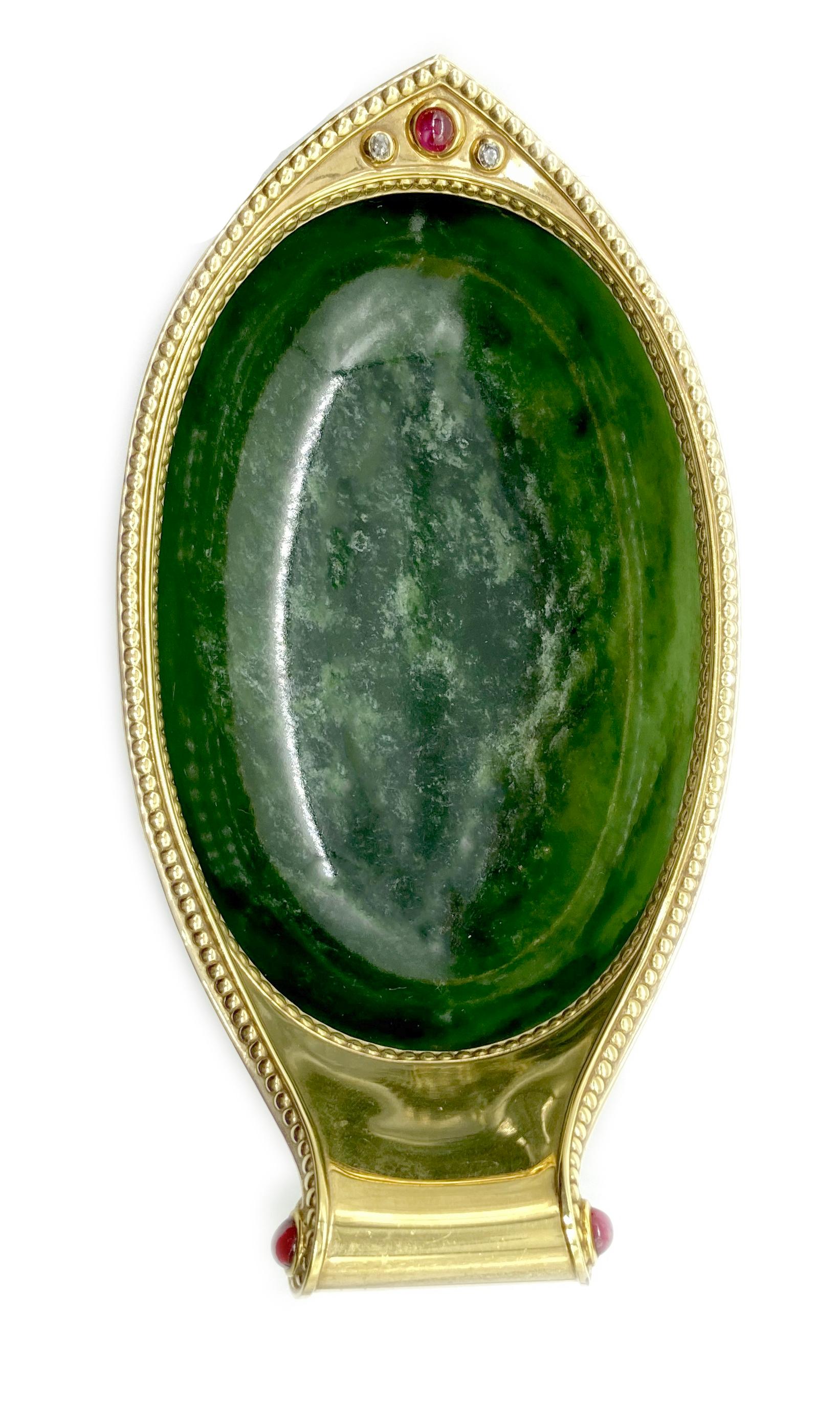 An antique nineteenth century nephrite, gold, and ruby kovsh by Fabergé. Certificate available. The Kovsh is a traditional drinking vessel or ladle from Russia. Versions in precious metals and stones were produced as gifts to be given by the royal