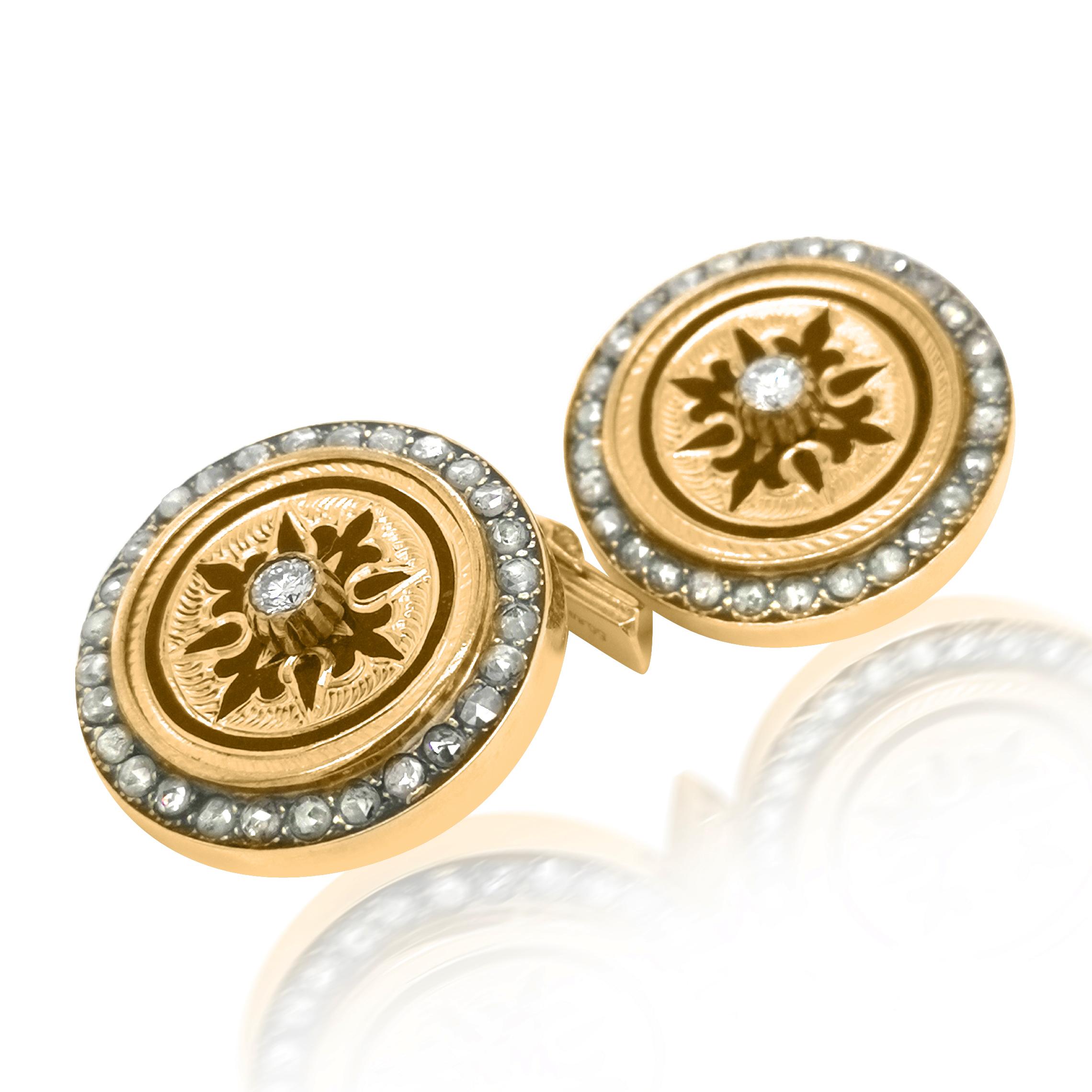 This pair of authentic Farberge diamond cufflinks is rendered in 14K yellow gold, centred with floral motif black enamel, enhanced with diamonds weighing approx. 1.2 carats in total. The cufflinks are 32mm in diameter, weighing 24.17 grams. Comes