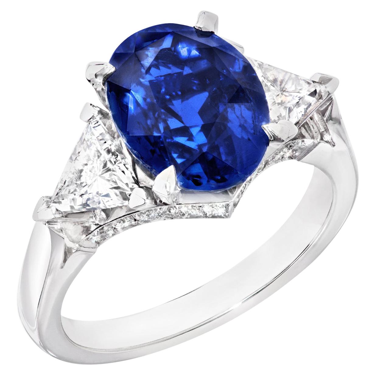 Fabergé Platinum Oval 5.12ct Royal Blue Sapphire Ring Set With White Diamonds For Sale