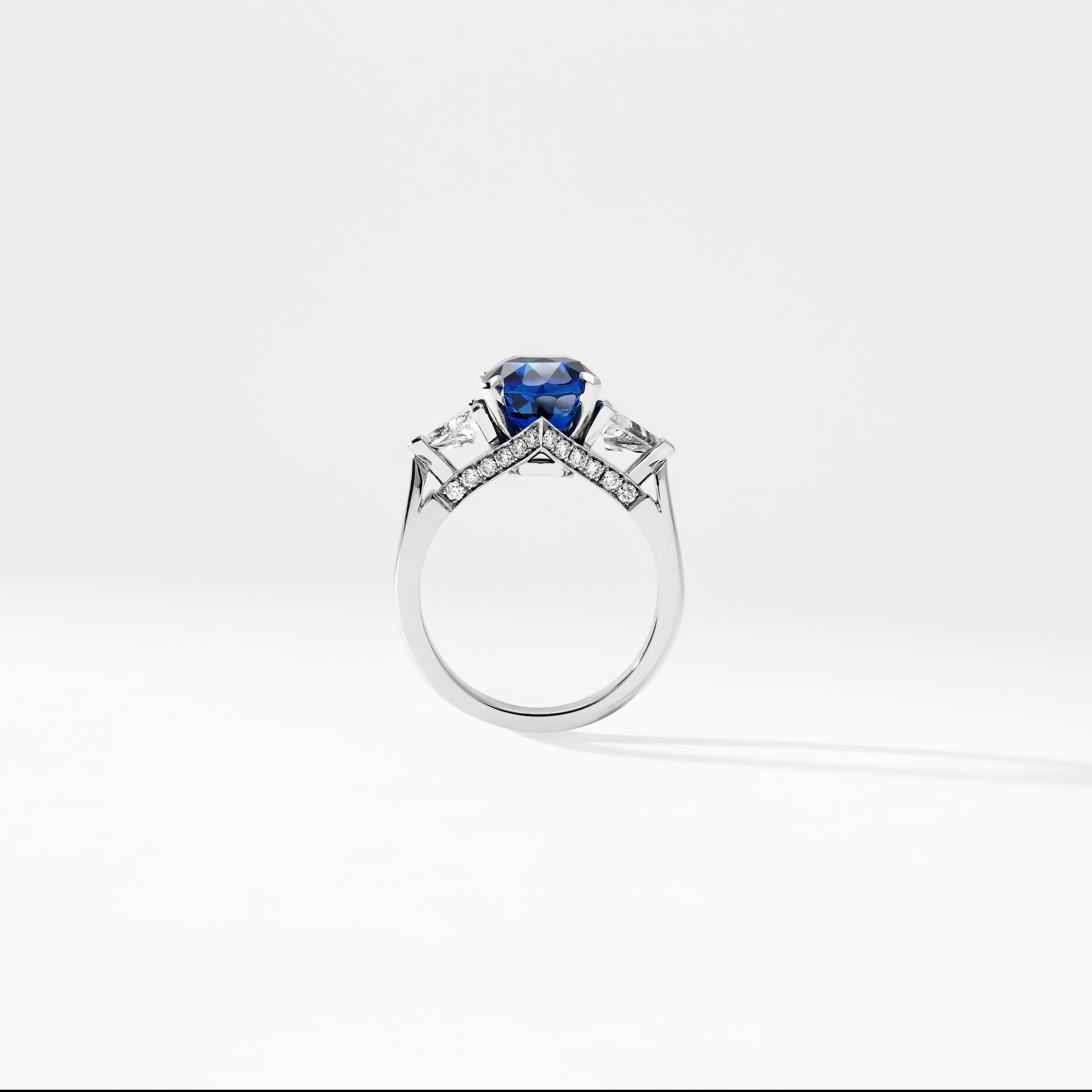 Oval Cut Fabergé Platinum Oval 5.12ct Royal Blue Sapphire Ring Set With White Diamonds For Sale