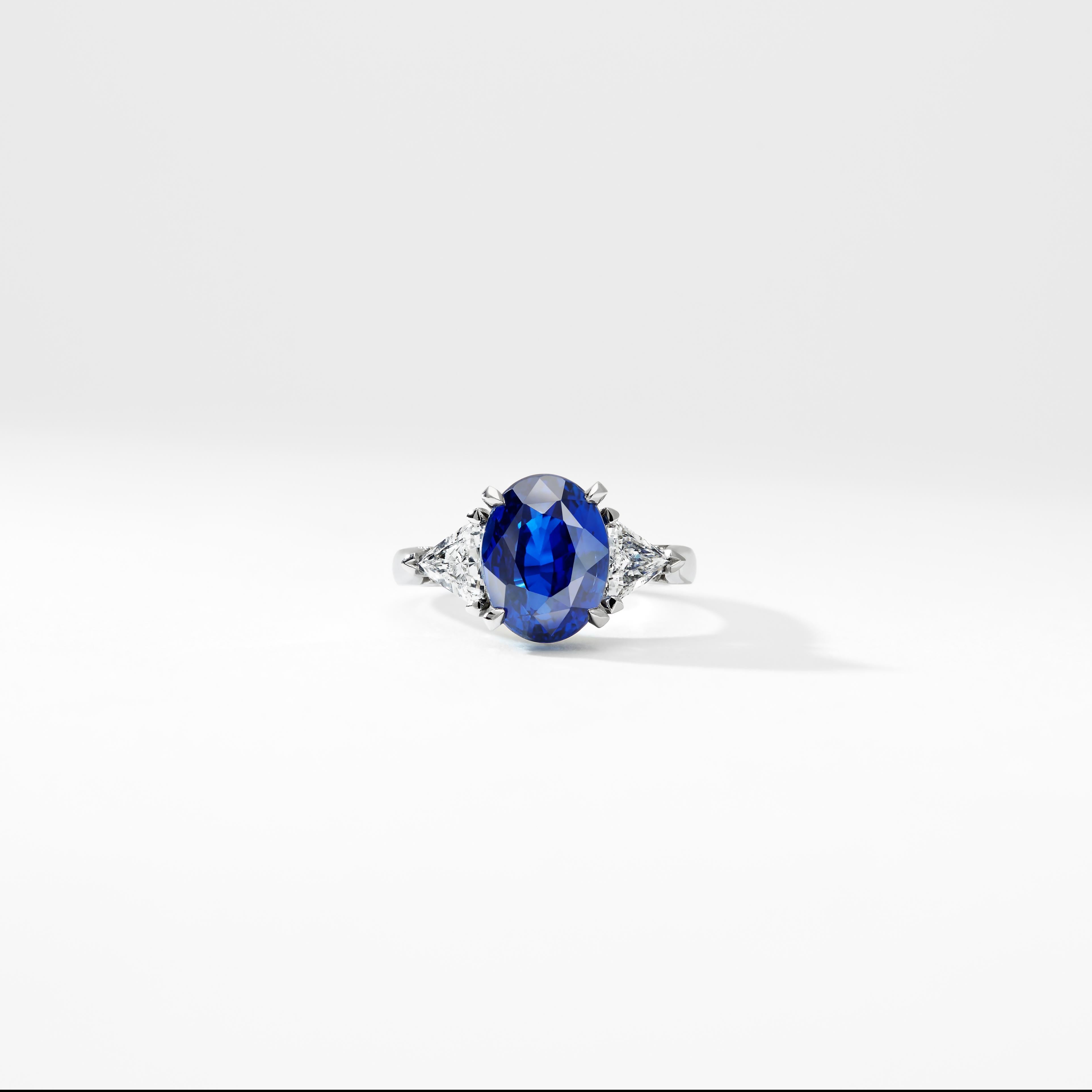 Fabergé Platinum Oval 5.12ct Royal Blue Sapphire Ring Set With White Diamonds In New Condition For Sale In London, GB