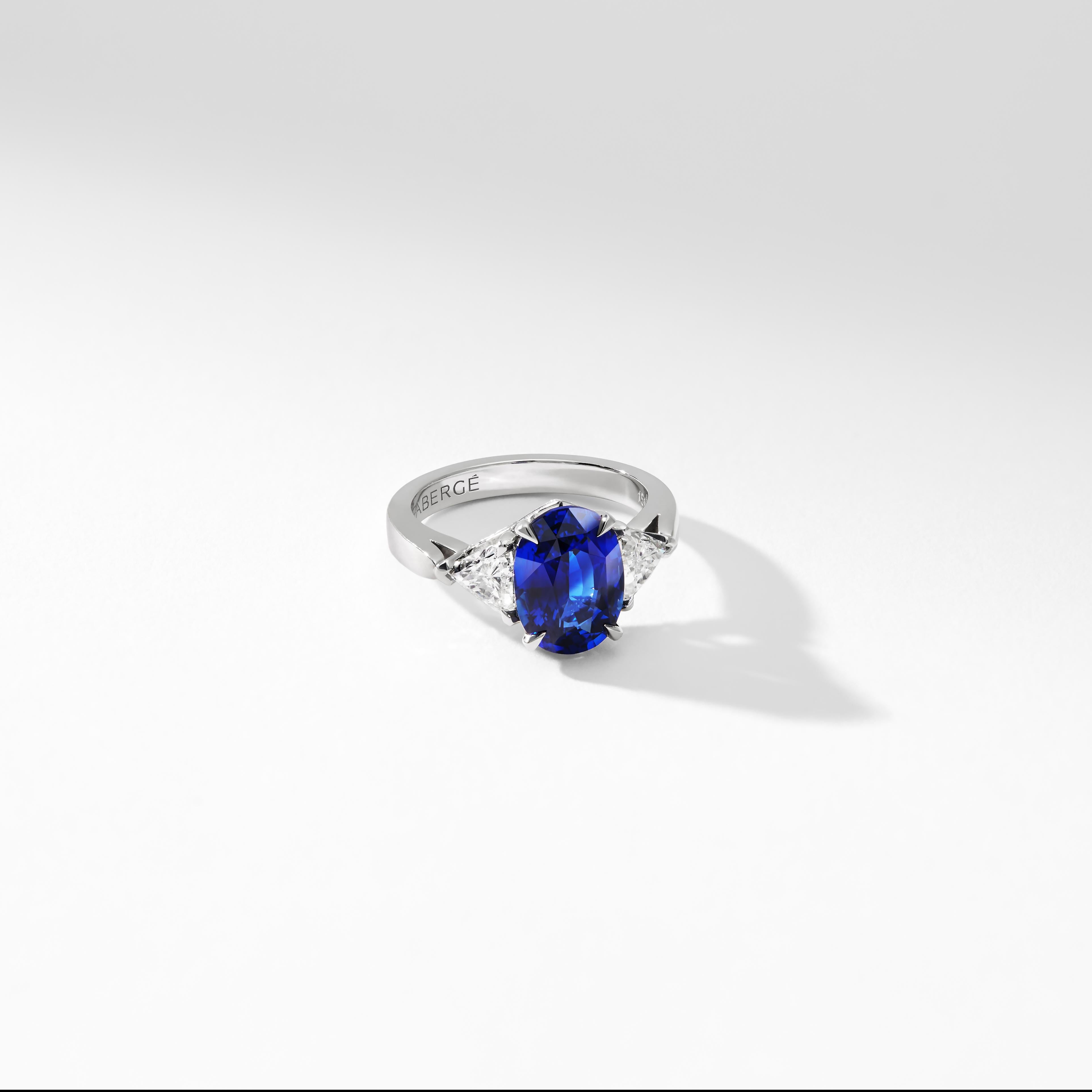 Women's Fabergé Platinum Oval 5.12ct Royal Blue Sapphire Ring Set With White Diamonds For Sale
