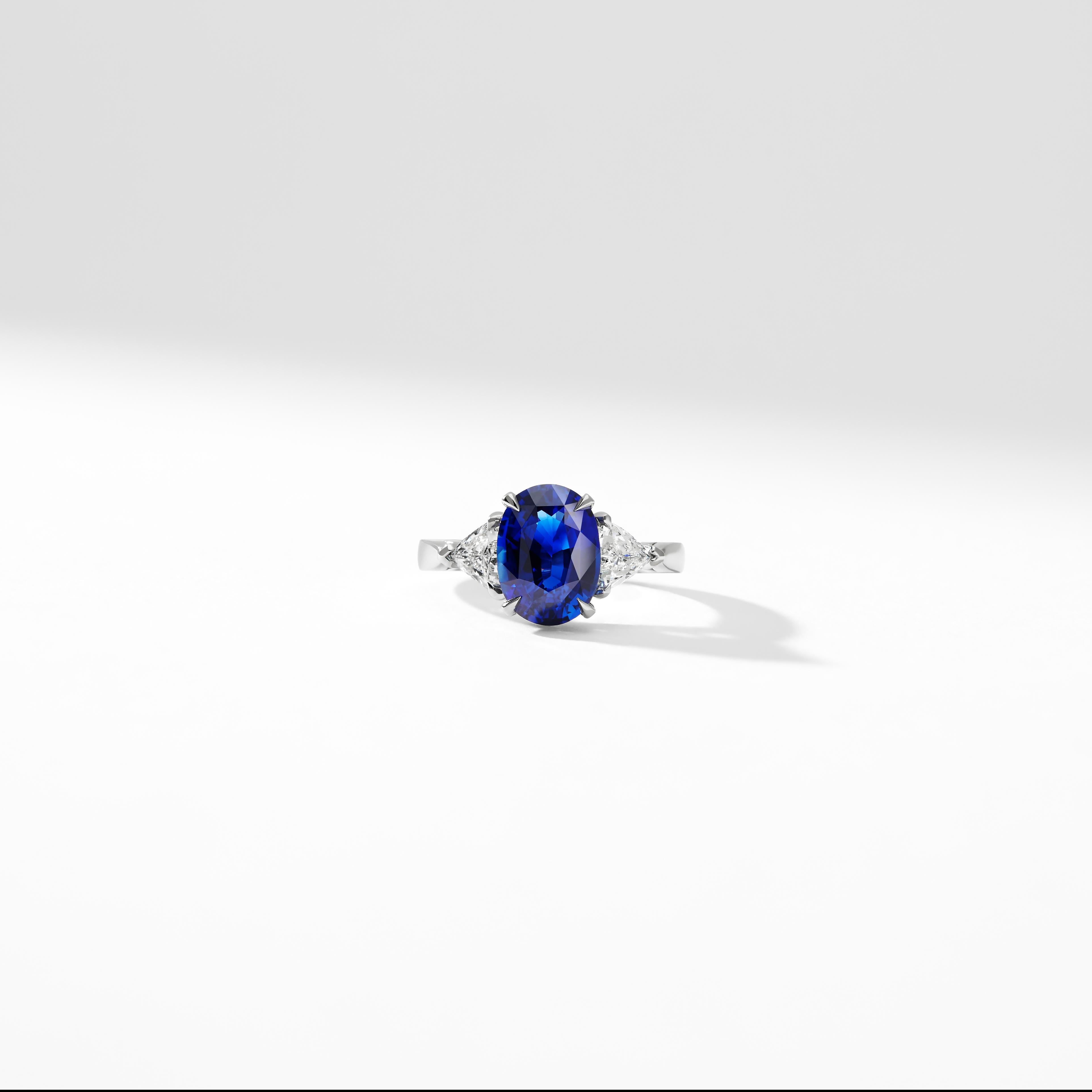 Fabergé Platinum Oval 5.12ct Royal Blue Sapphire Ring Set With White Diamonds For Sale 2