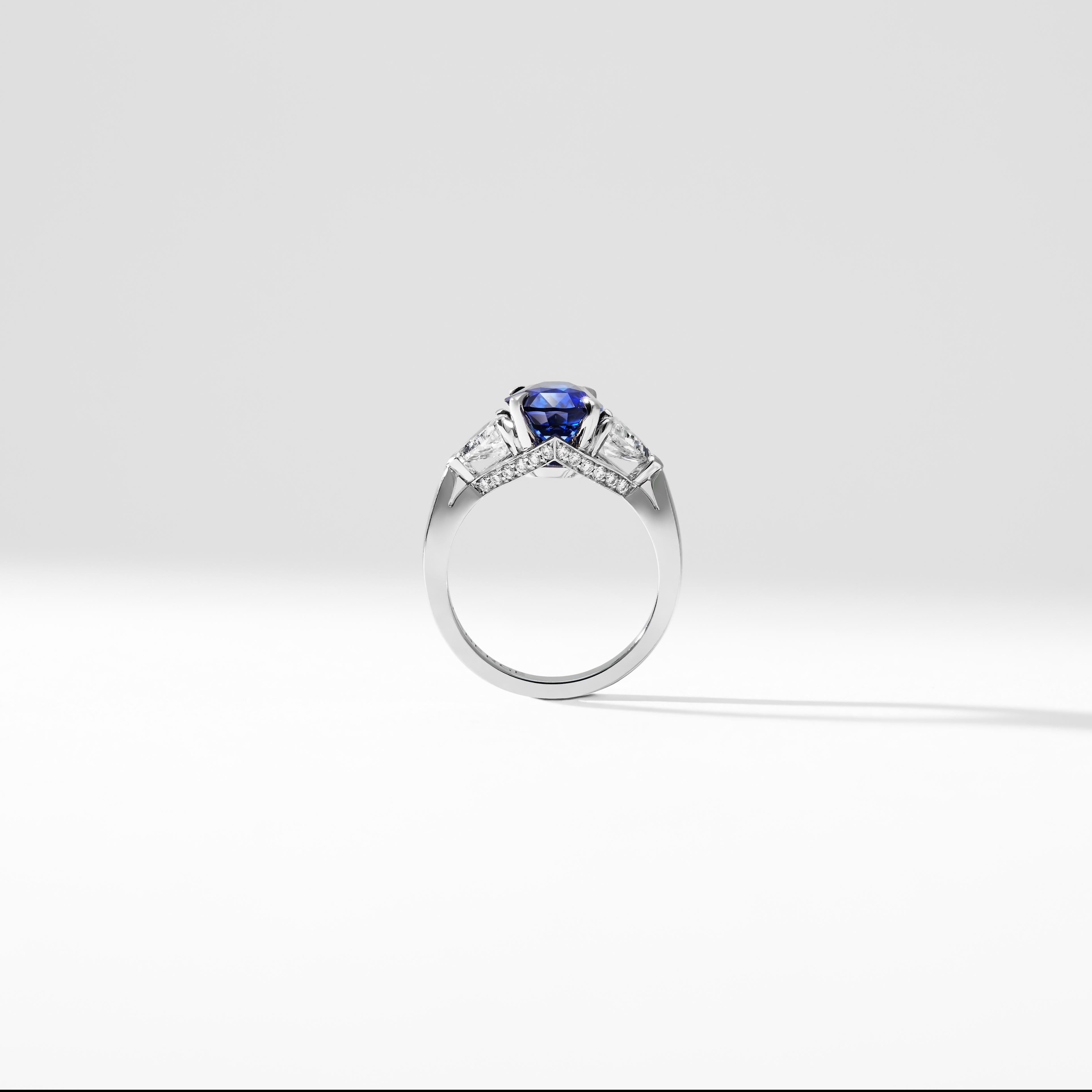 Fabergé Platinum Oval 5.12ct Royal Blue Sapphire Ring Set With White Diamonds For Sale 3