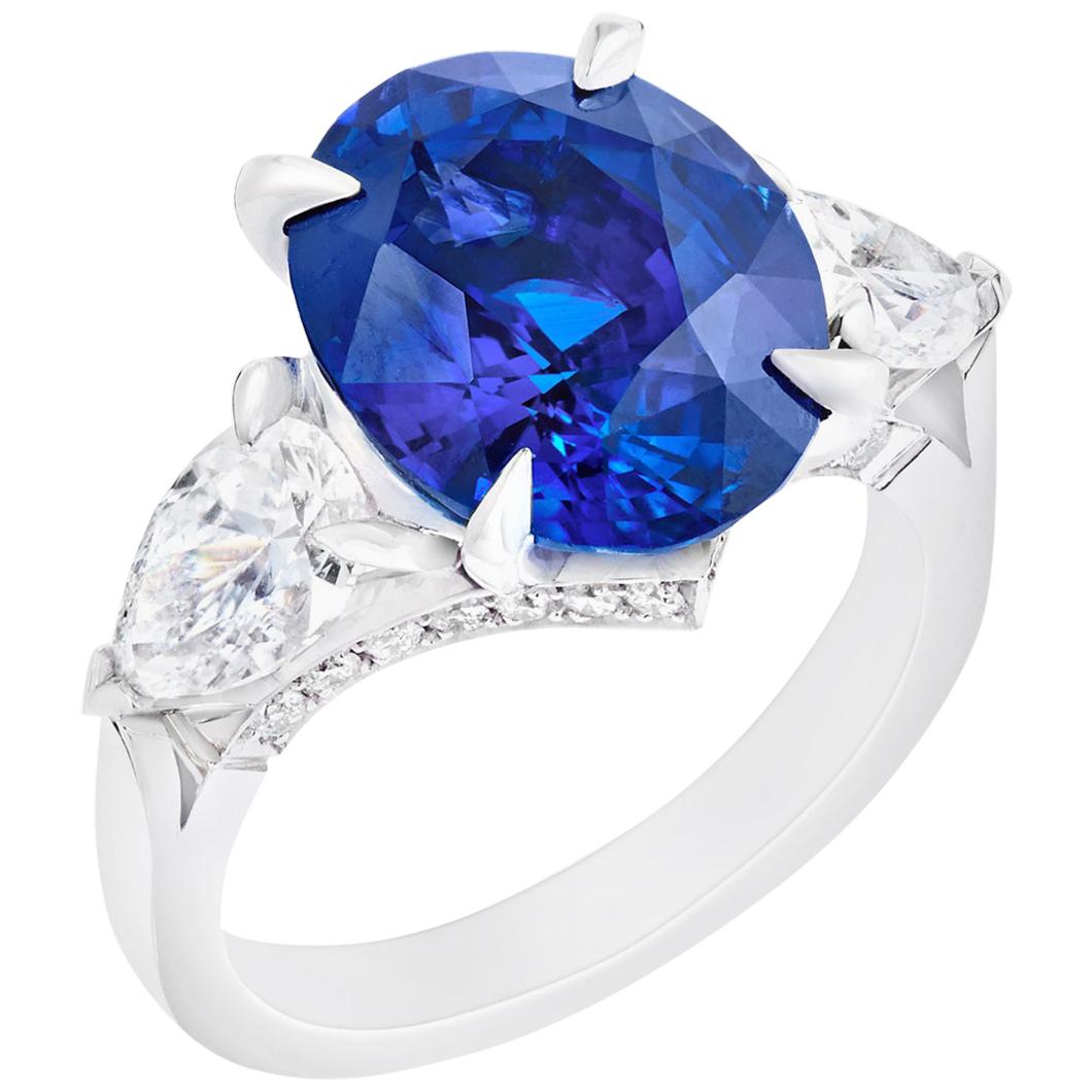 Fabergé Platinum Oval Blue Sapphire Ring With Pear Shaped & Round White Diamonds For Sale