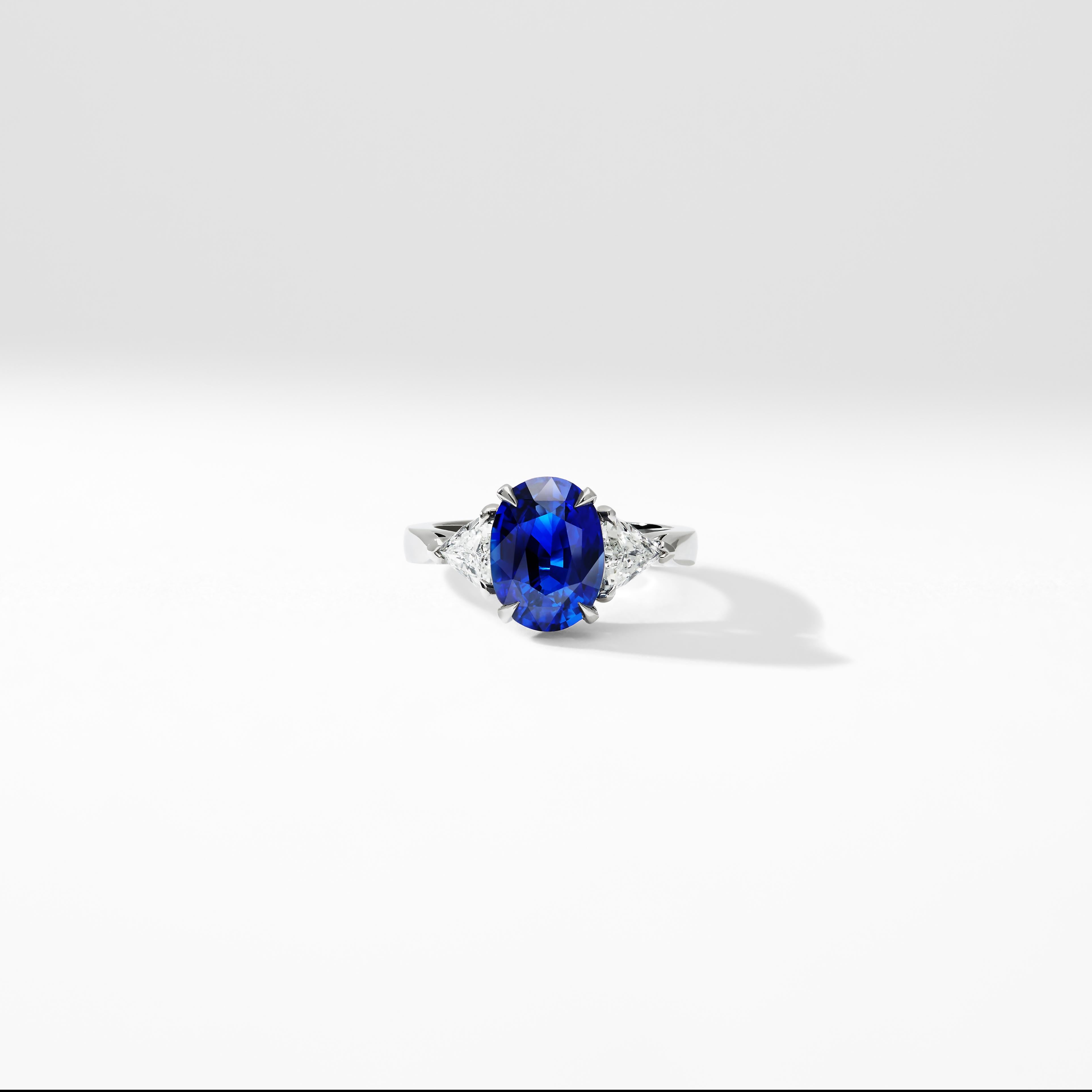 Fabergé Platinum Oval Blue Sapphire Ring With Pear Shaped & Round White Diamonds In New Condition For Sale In London, GB