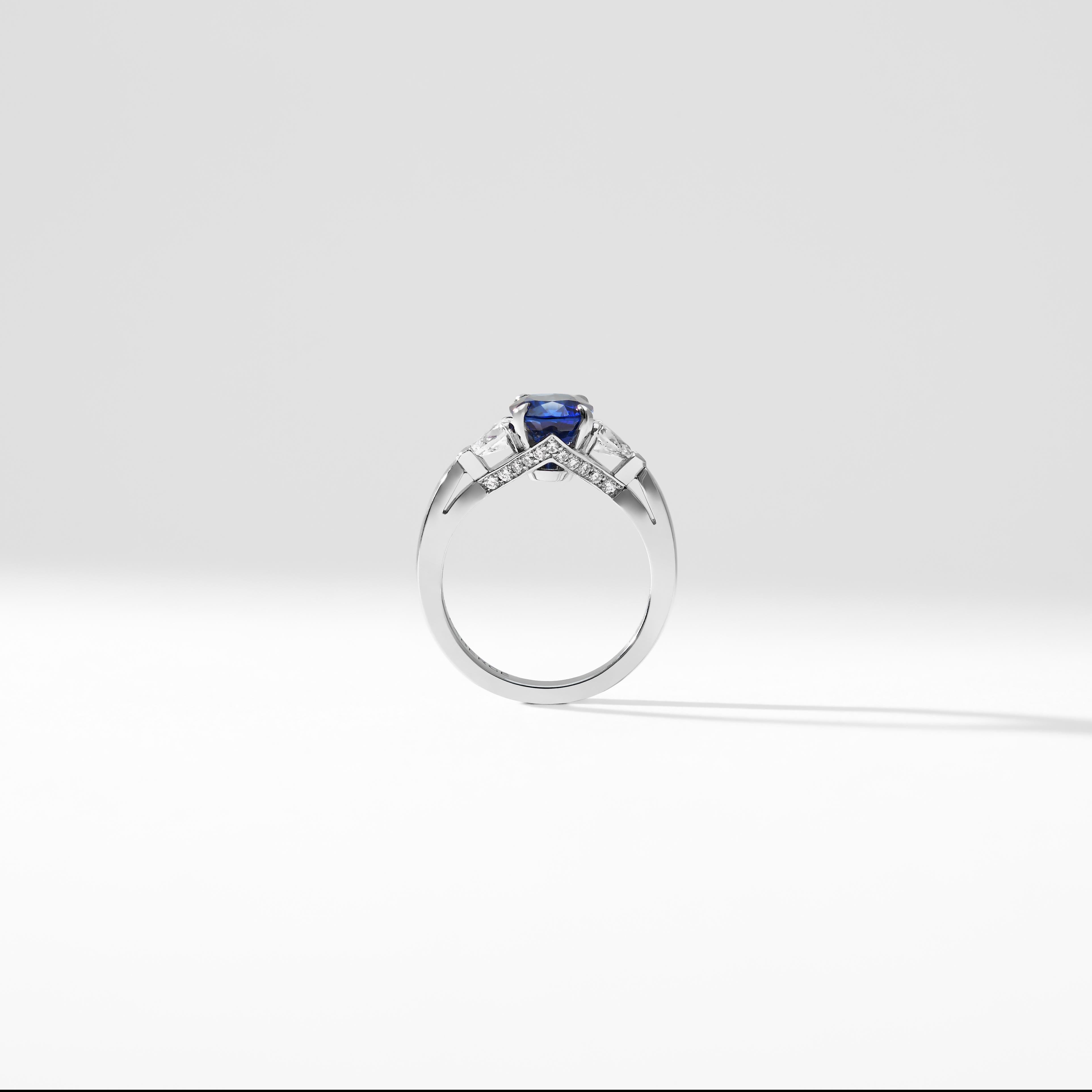 Fabergé Platinum Oval Blue Sapphire Ring With Pear Shaped & Round White Diamonds For Sale 3