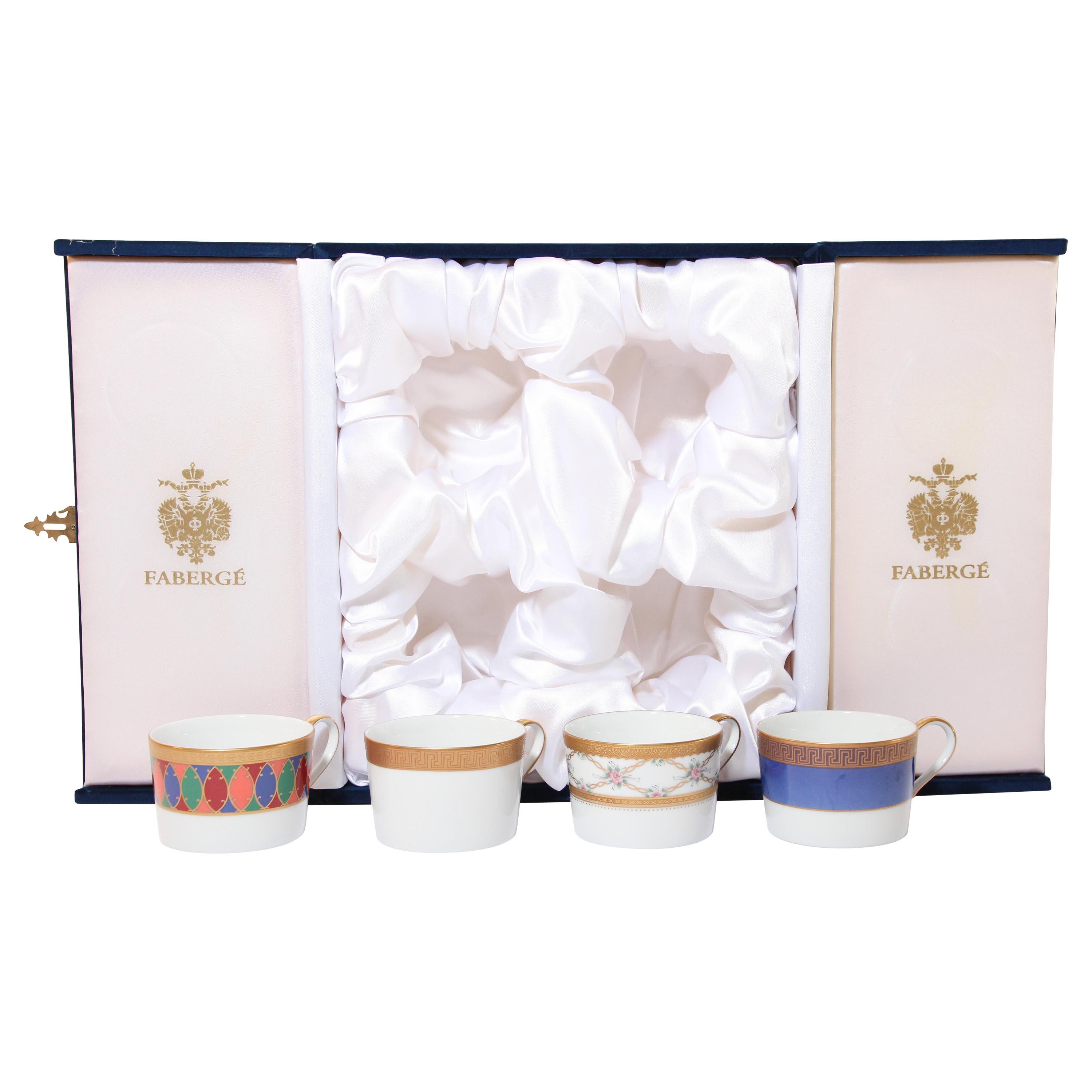 Juego de cuatro tazas de té y café de porcelana Fabergé en estuche de terciopelo