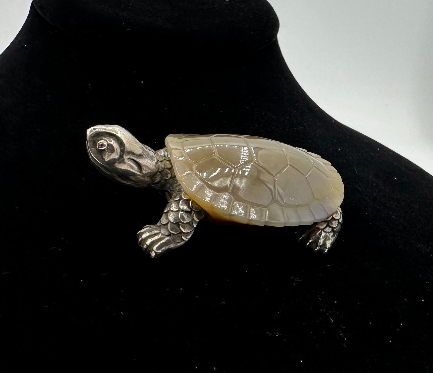 This is a magnificent Faberge Turtle or Tortoise in Silver with Ruby Eyes and a carved Agate Shell signed I.P. for the famed Faberge Workmaster Julius Rappoport.  The spectacular carved and jeweled turtle is a masterwork by Faberge's most famous