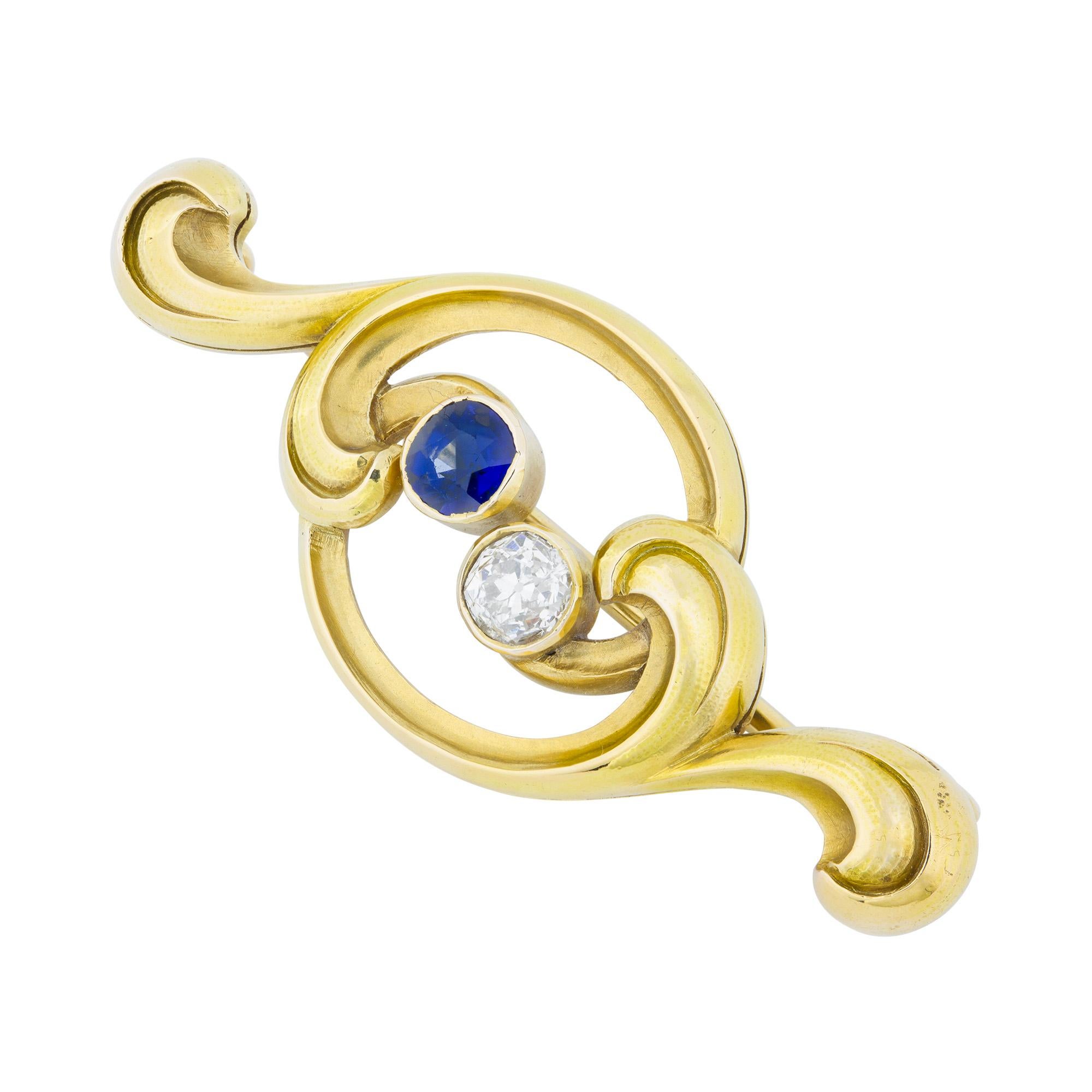 A Fabergé sapphire and diamond brooch, the yellow gold scroll set with a rose-cut diamond and sapphire, collet set, estimated approximate diamond weight 0.20 carats, estimated approximate sapphire weight 0.20 carats, marked KF in cyrillics, pin