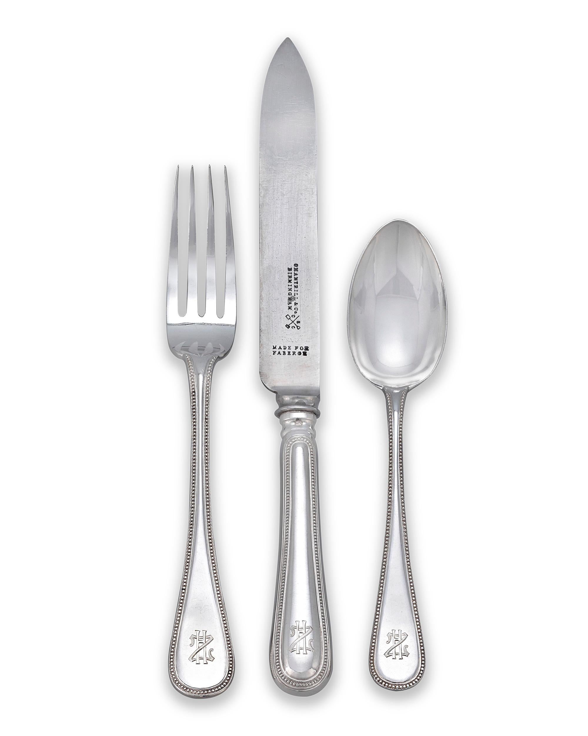 Gilt Fabergé Silver Flatware Service for 24