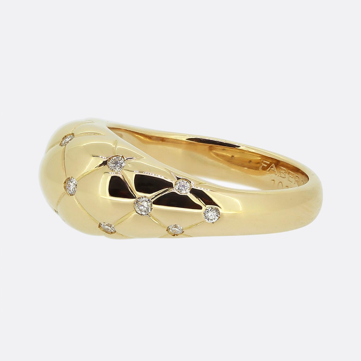 Here we have a beautiful tapered dome ring from Fabergé's timeless 'Treillage' collection. This piece features an engraved quilted design that is inspired by the Diamond Trellis Egg created by Fabergé in 1892. The ring is expertly crafted from