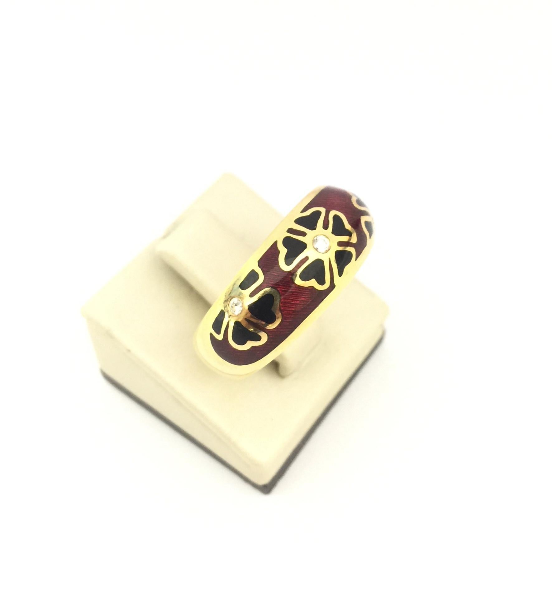 Faberge Woman's Ring.
18k Yellow Gold 
Red and Black Enamel
Diamonds 0.045cts
Size 7
F2422N4