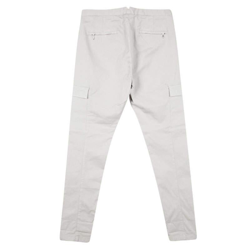 Ditch those regular jeans for the summers ahead and go for these cool cargo trousers from the house of Fabiana Filippi. It features a beige cotton and elastane body and lined with a cotton interior. It comes equipped with cargo pocket detailing and