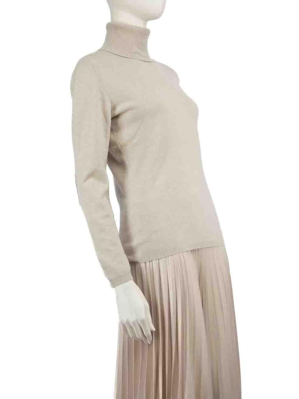 CONDITION is Very good. Hardly any visible wear to jumper is evident on this used Fabiana Filippi designer resale item.
 
 
 
 Details
 
 
 Grey
 
 Wool
 
 Long sleeves jumper
 
 Knitted and stretchy
 
 Turtlneck
 
 Suede elbow patch detail
 
 
 
 
