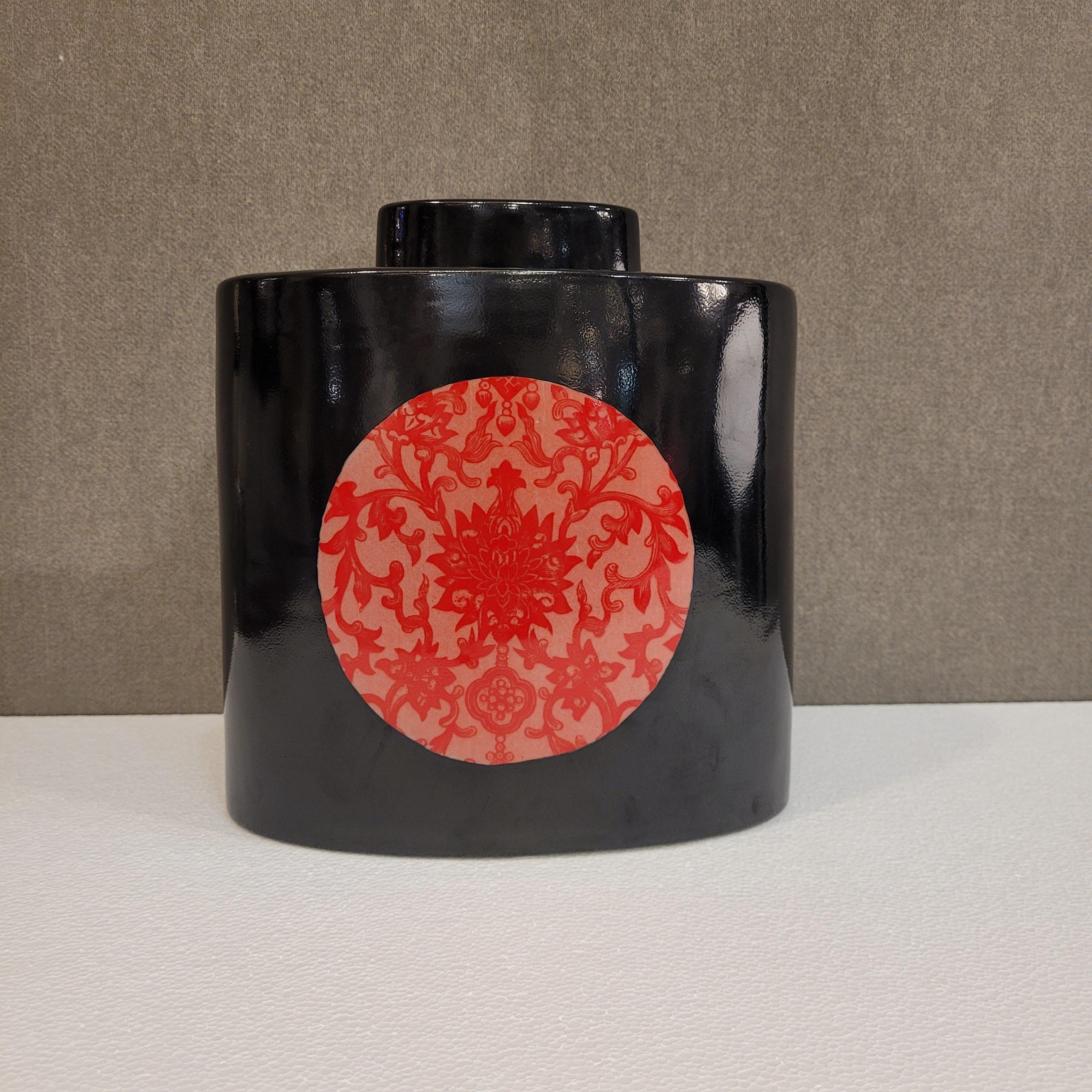 Beautiful Jar or Vase in chinese hand painted porcelain , dedigned by French artist Fabienne Jouvin .
on one side with black background Asian decoration with a great  red moon  and on the other side in a grisaille style portrait of Geisha.
A