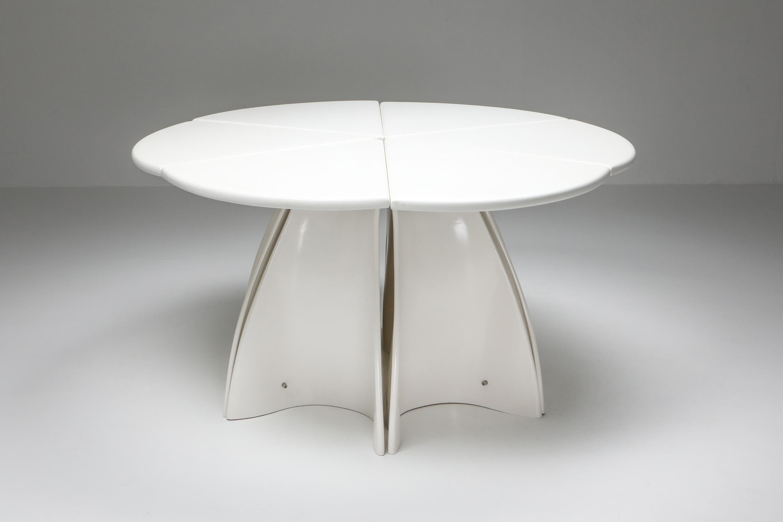 Space Age Postmodern rare piece by Fabio Lenci, Italy 1960s.

This unique tables consists out of 6 ‘petals’ to make a full circle.
Each petal could be separated from the piece to be used as side tables or console tables.
When joined together