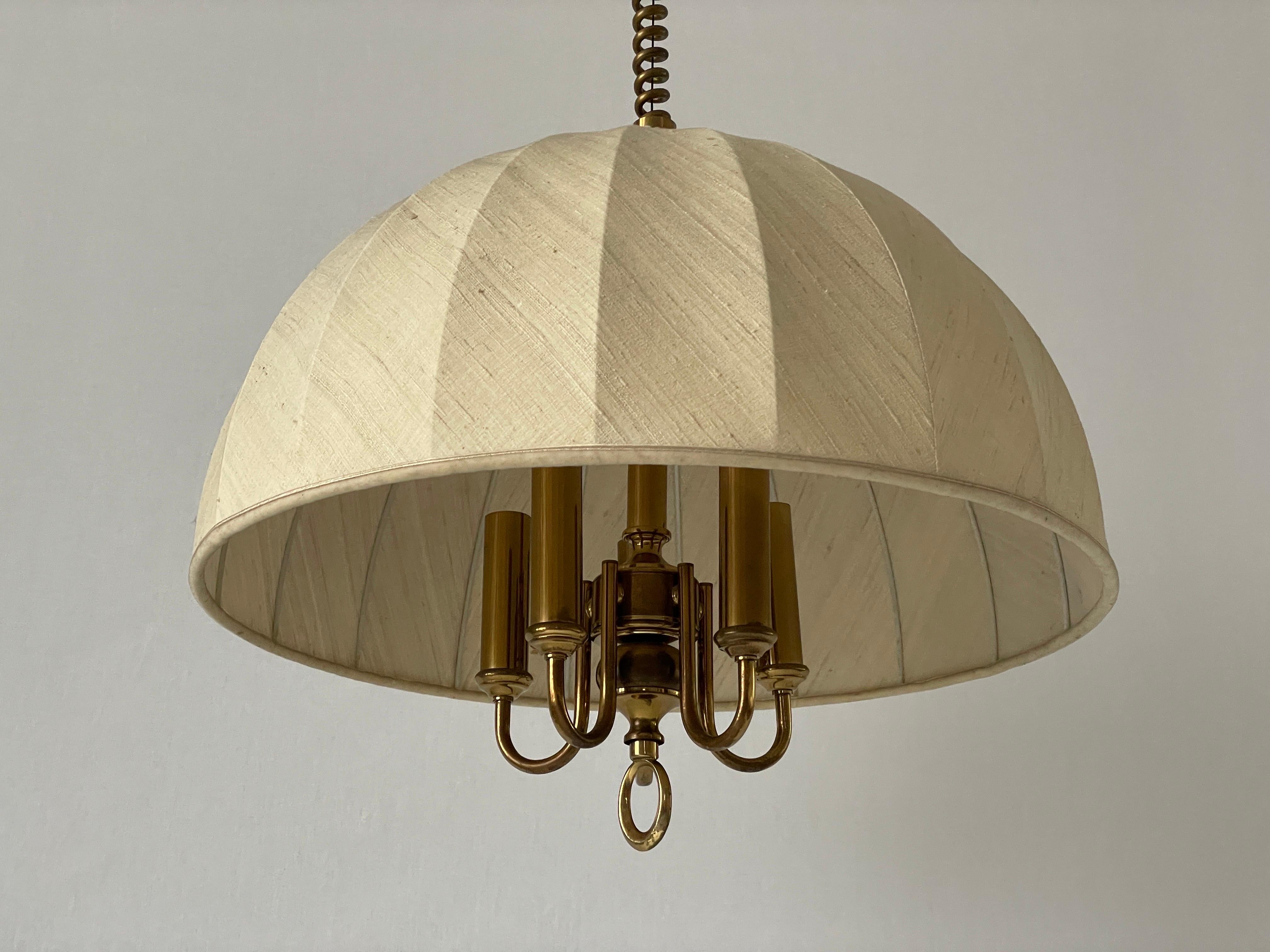 Beige Fabric and Brass 5 socket Adjustable Shade Mid-century Modern XL Pendant Lamp by WKR, 1970s, Germany

Adjustable large lampshade.

Brass body & fabric shade
Manufactured in Germany

This lamp works with 5 x E14 light bulbs.

Measures: 
Height