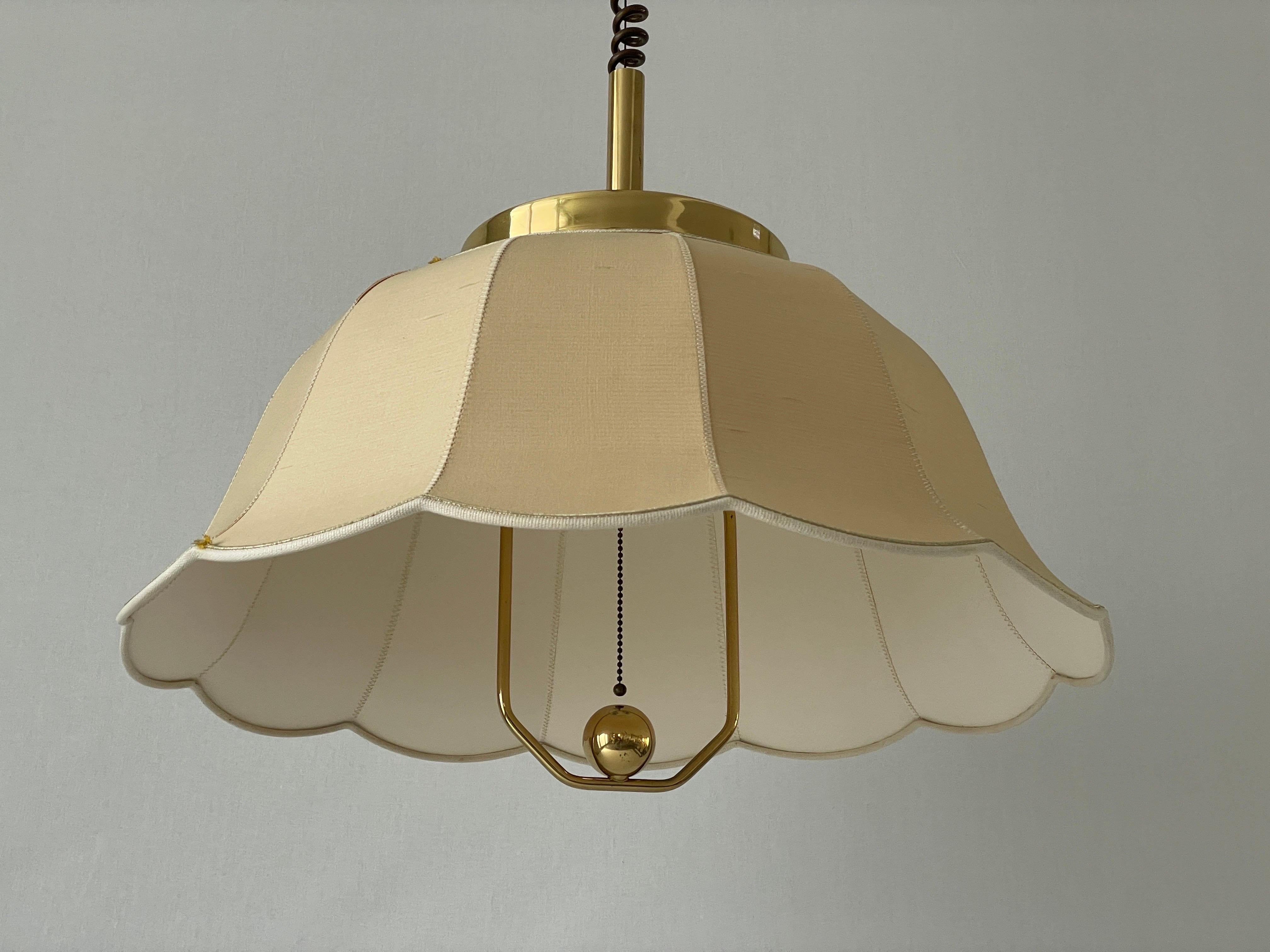 Beige Fabric and Brass 5 socket Adjustable Shade Mid-century Modern XL Pendant Lamp by WKR, 1970s, Germany

Adjustable large lampshade.

Brass body & fabric shade
Manufactured in Germany

Working Principle:
When you pull the thread, first you light