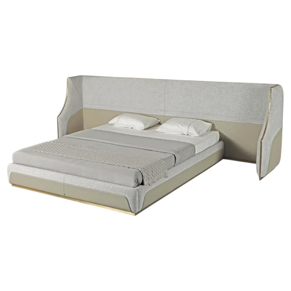 Fabric and leather upholstered Henri Bed by Madheke
