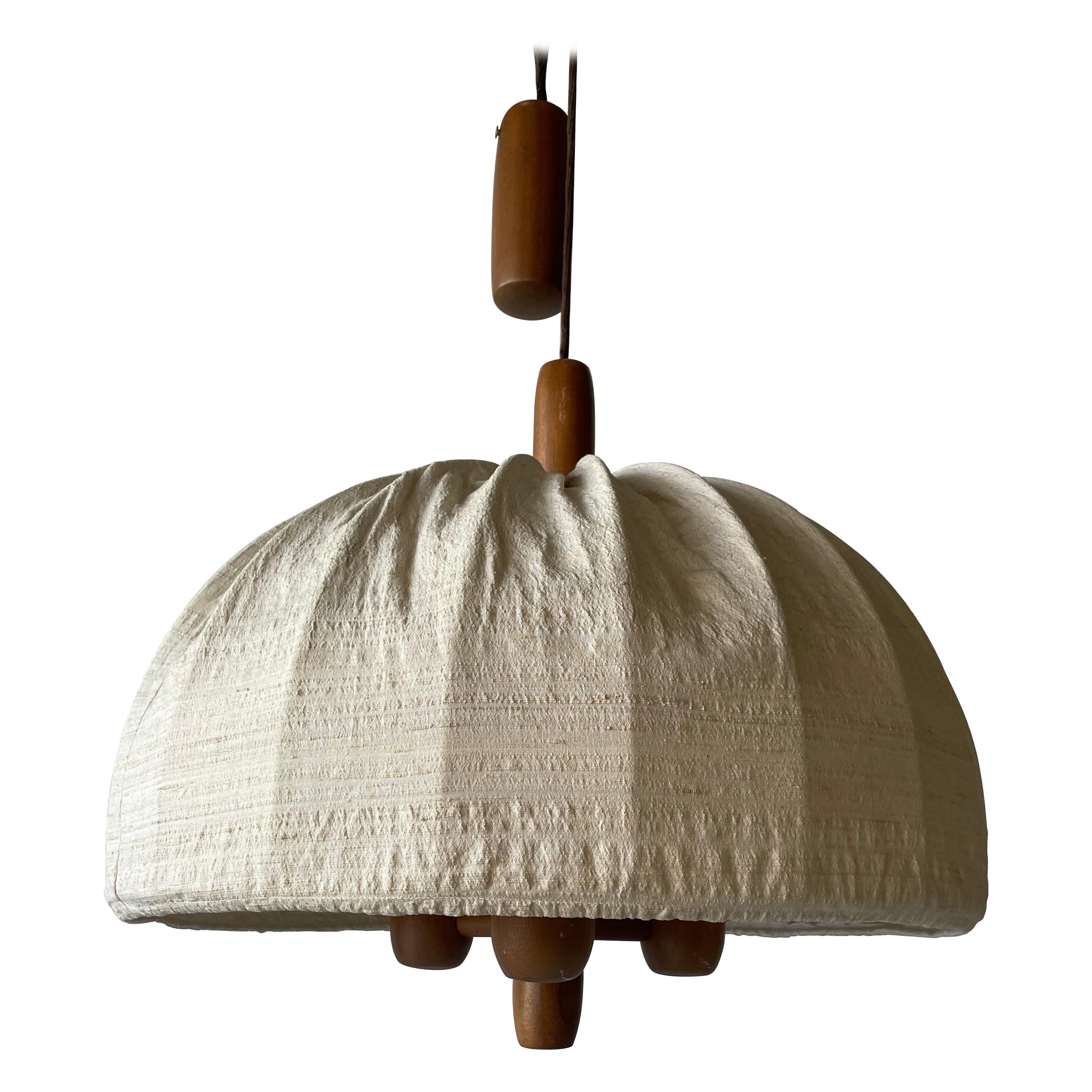 Lampada a sospensione a contrappeso in Fabrice e Teak, anni 
70, Germania in vendita