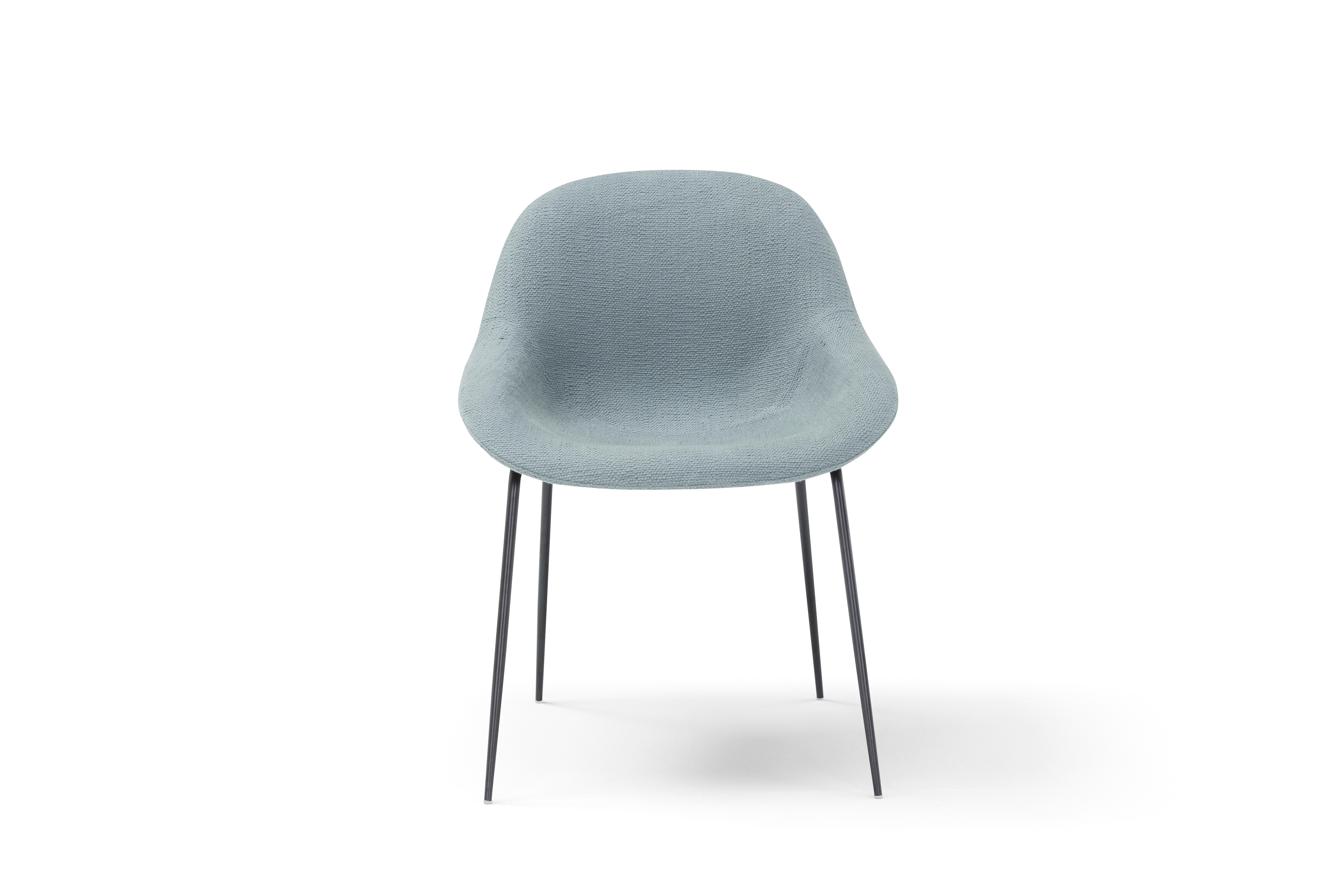 Fabric Medea Dining Chair by Amura Lab
Dimensions: W 55 x D 52 x H 56 cm
Materials: STRUCTURE: Moulded polyurethane foam + fiberglass PADDING: polyurethane foam, density 35+45 kg/m³ BASE: metal.

Amura Lab:
In their gaze, they carry the strong and