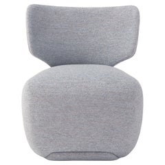 Sillón de tela Noa de Amura Lab