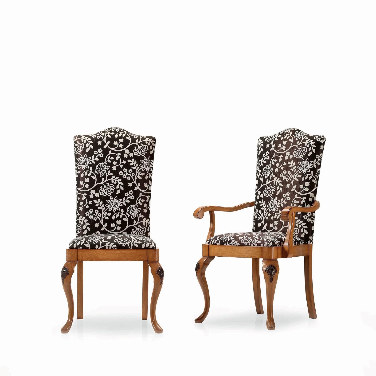 A modern take on a classic Rococo style, this chair is an ideal accent for a living room, study, or bedroom decor. Fashioned entirely of wood, it is crafted in the Queen Anne style, evident in the scalloped top rail, tall back, curved armrests, and